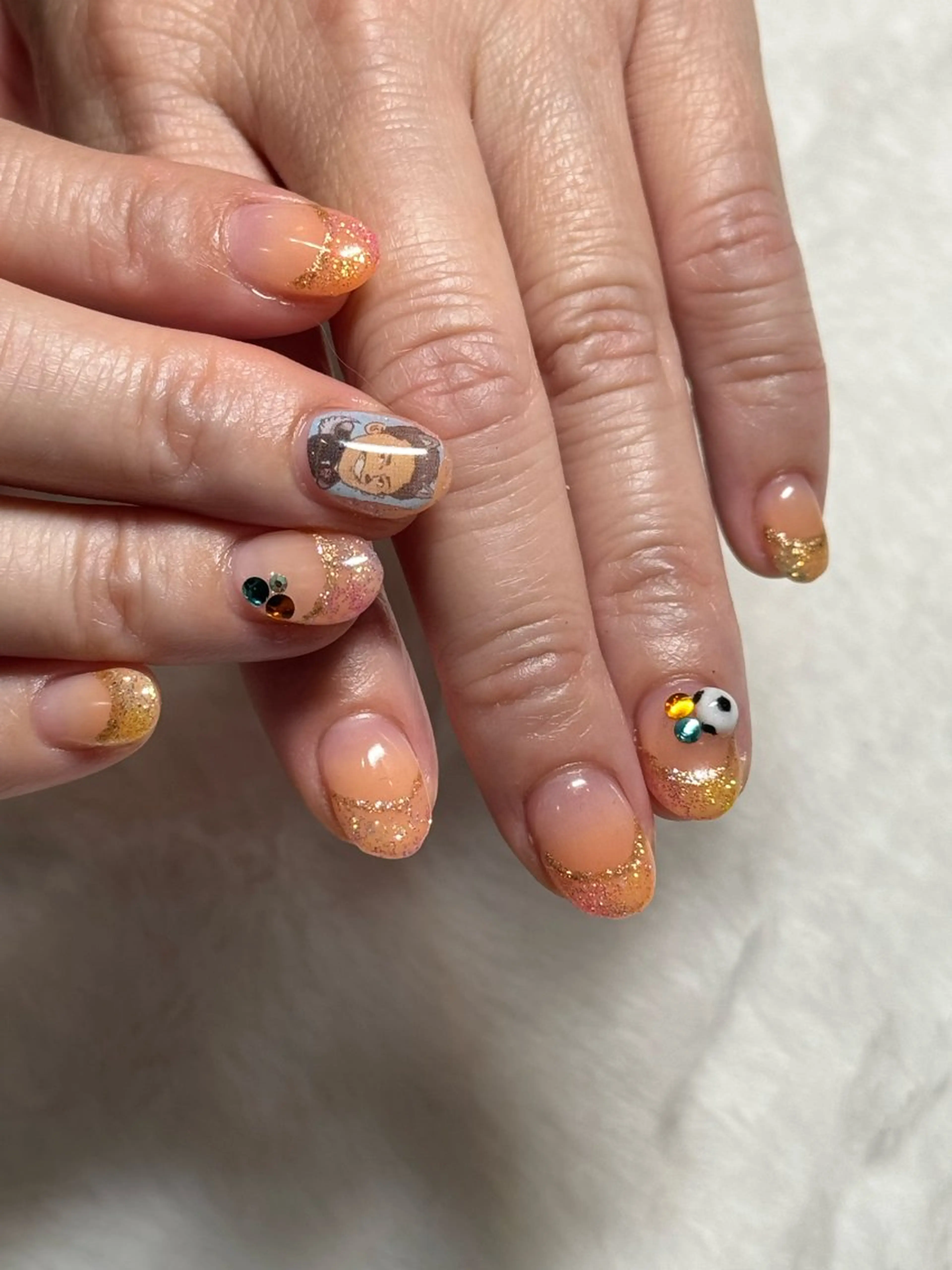 ネイル グラデーション ラメ(グリッター) オレンジ ハンドネイル フットネイル オフザリップパーク Asamiのネイルデザイン