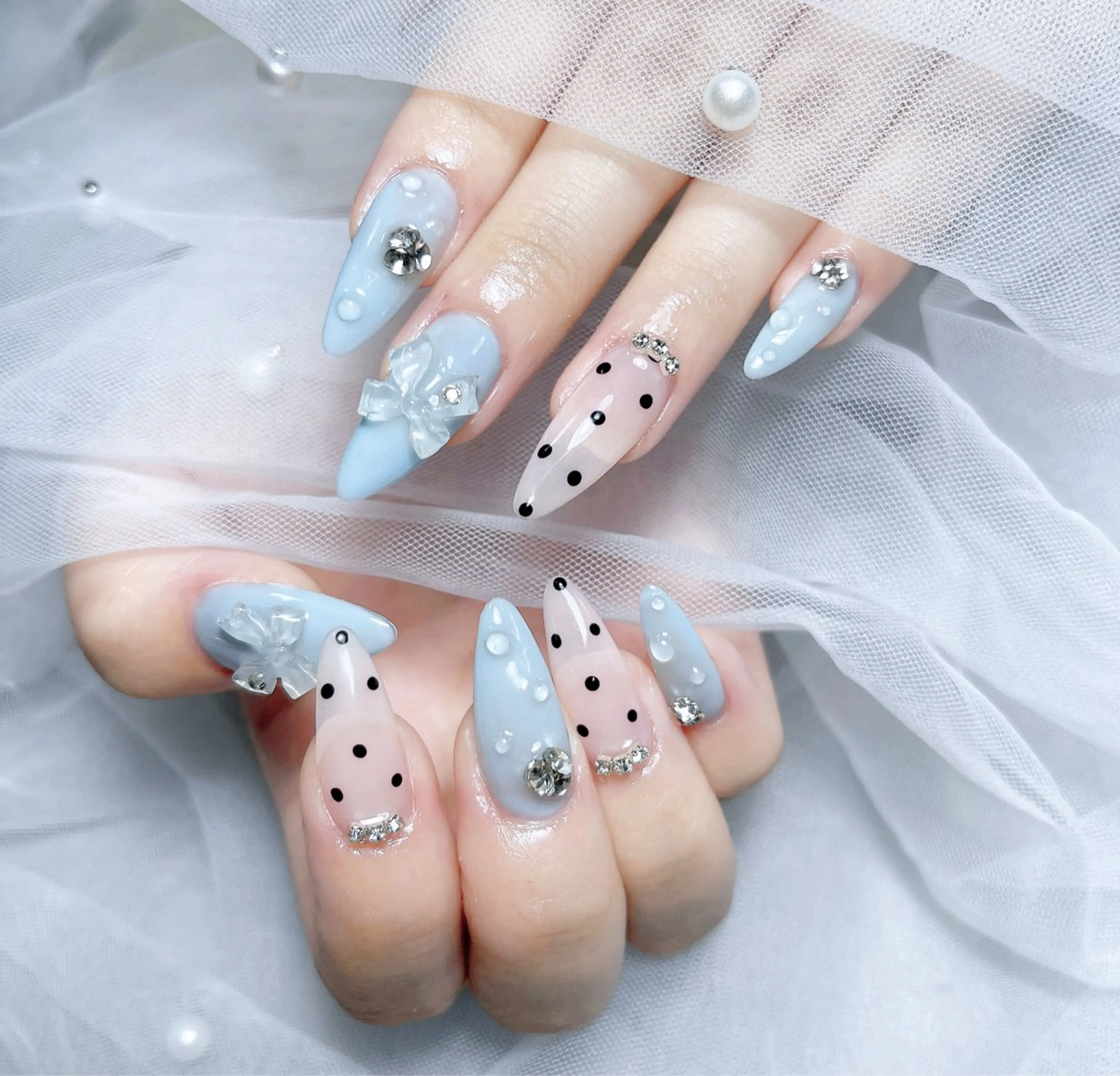 ネイル 成人式 ロングネイル マグネットネイル 大理石ネイル(マーブル) リボン ハンドネイル Amee Nailsalon所属・Amee Nailsalonのネイルデザイン