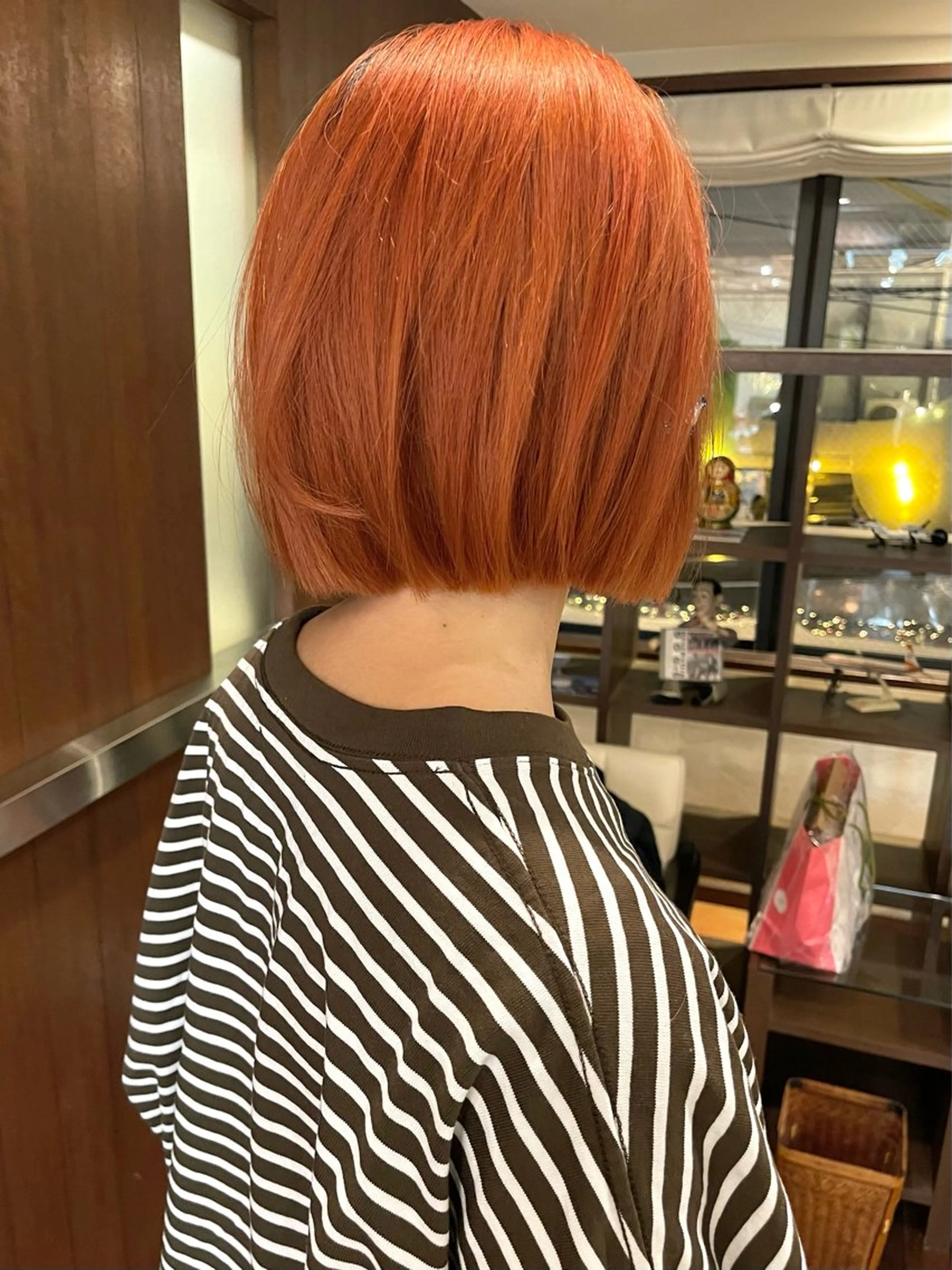 ショート カラー オレンジ カット ヘアカラー トリートメント 髪質改善ｶﾗｰ ｹｱﾌﾞﾘｰﾁ/ﾀﾑのヘアスタイル