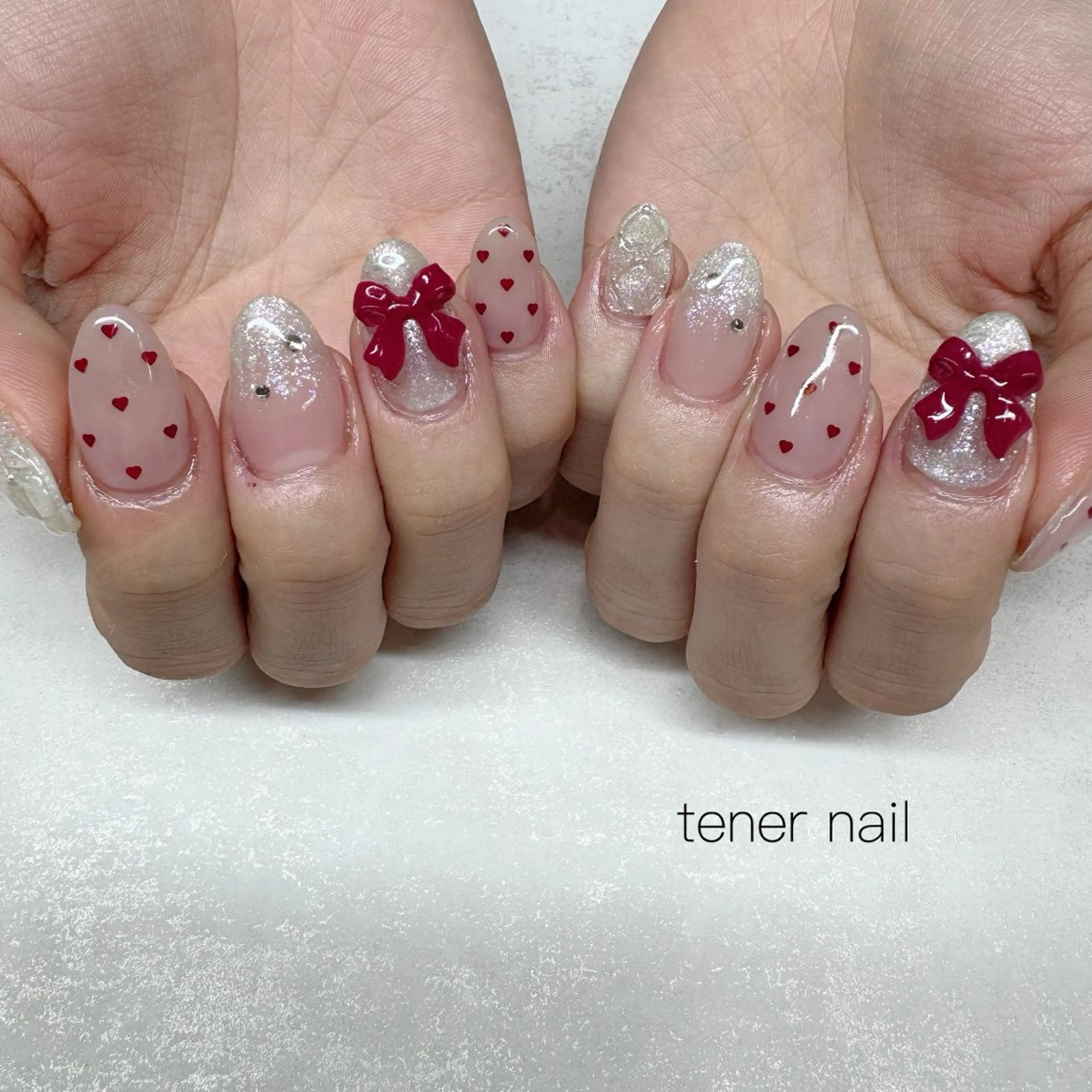 ネイル ハート ホログラムネイル リボン ハンドネイル tener  nail  テネルネイル所属・テネルネイル tener nailのネイルデザイン