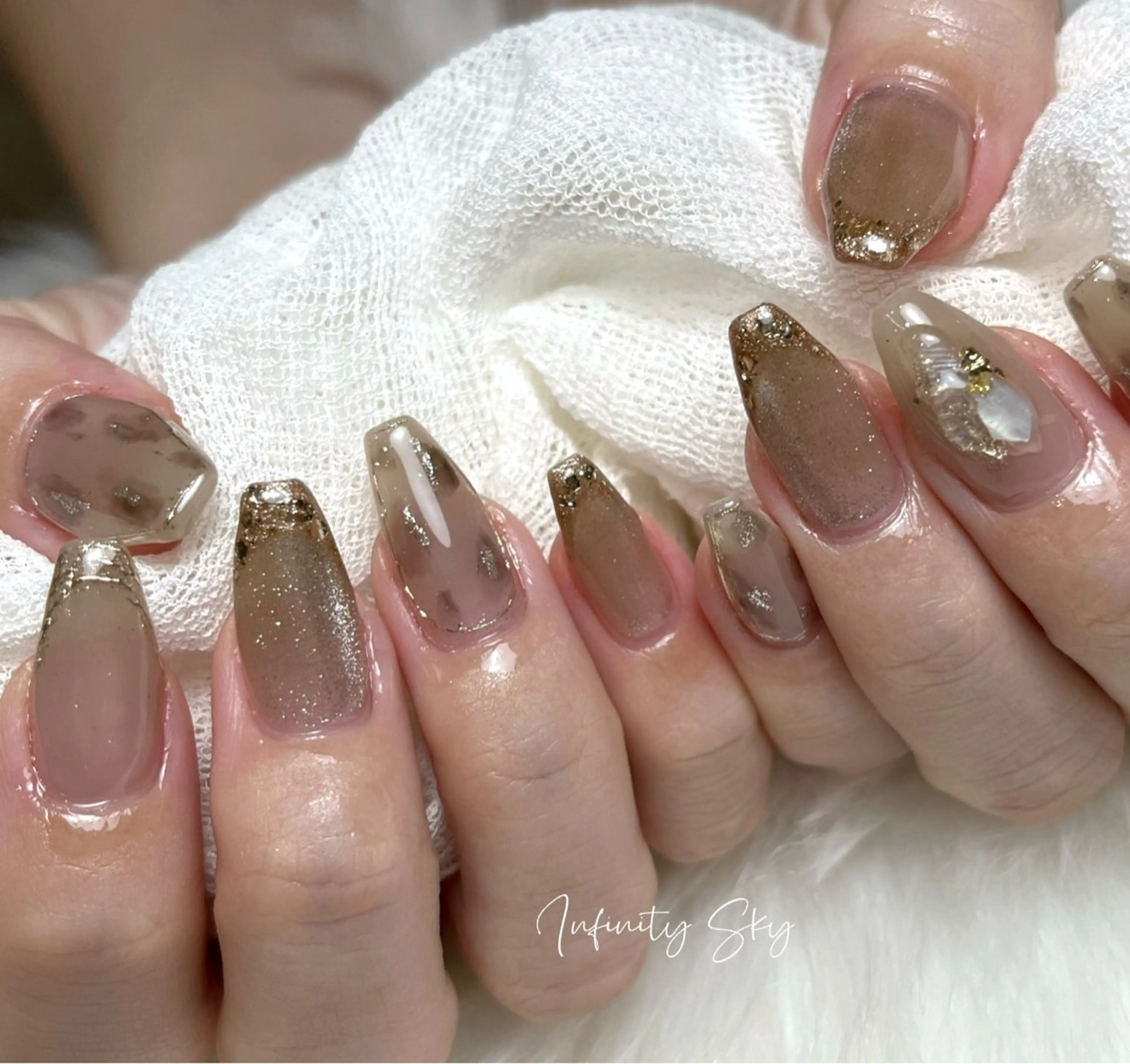 ネイル アニマル柄 ブラウン infinity skyのネイルデザイン