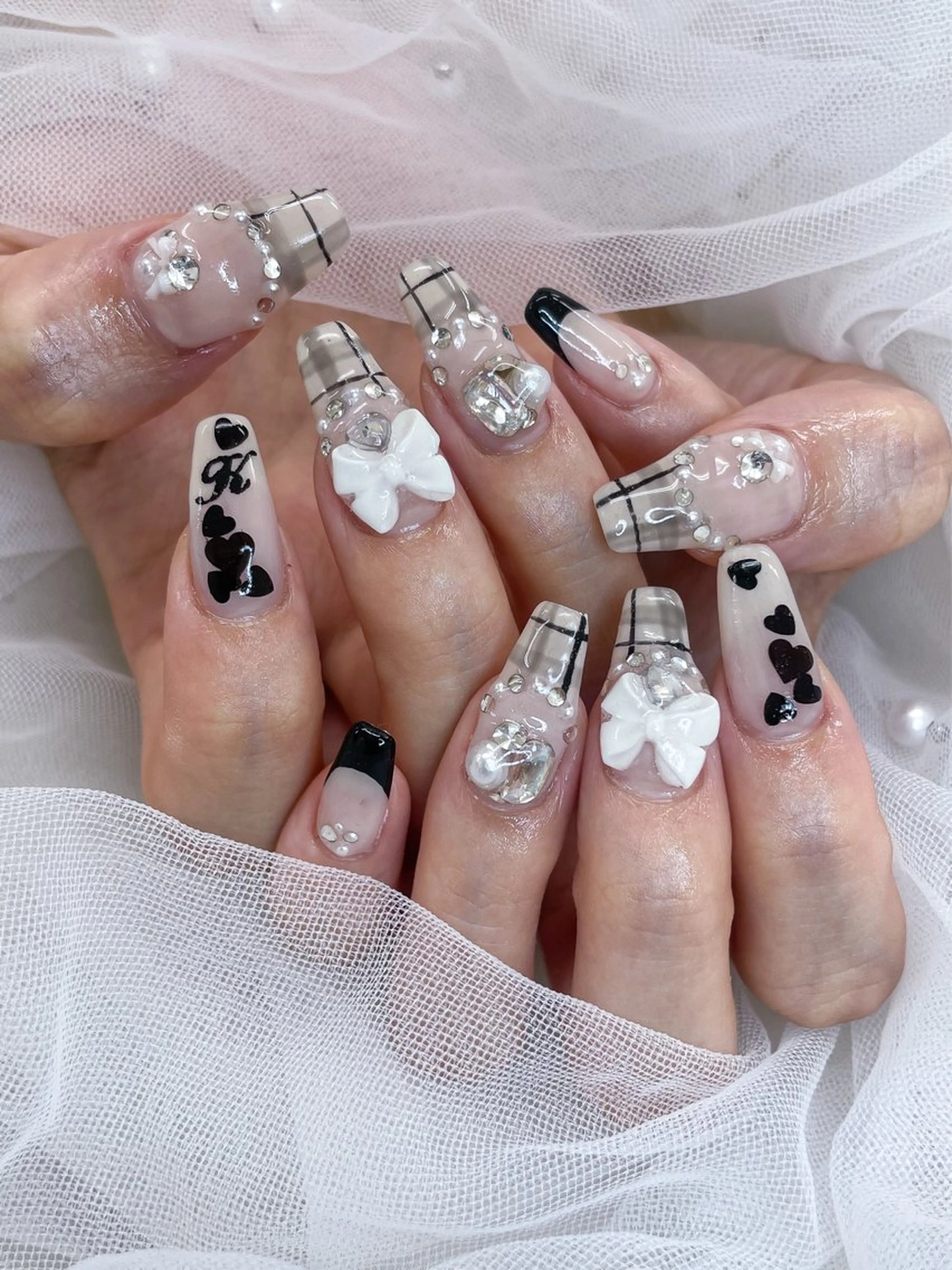 ネイル リボン ハンドネイル MiMi NAIL TOKYO所属・五十嵐 美智のネイルデザイン
