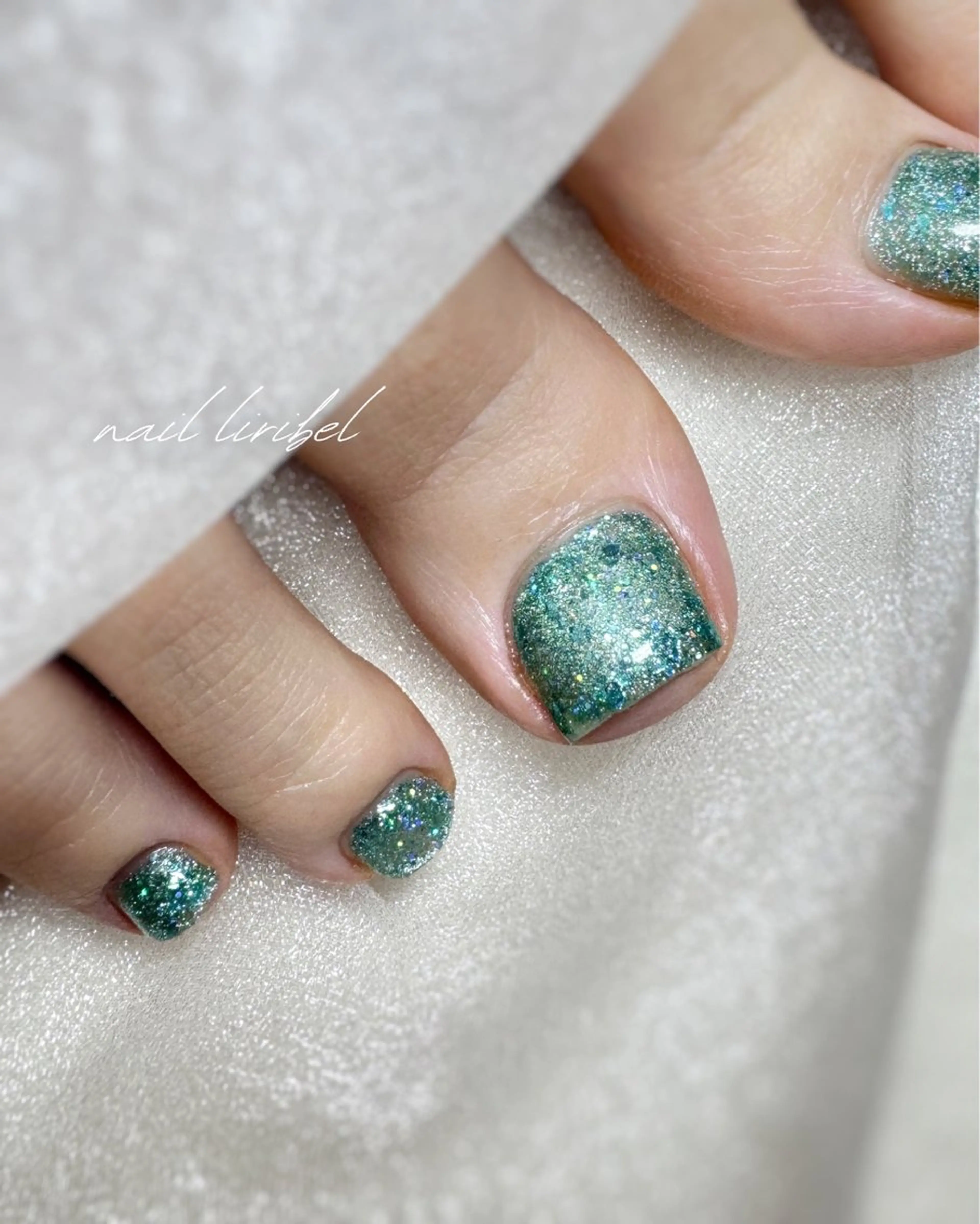 ネイル フラッシュネイル フラッシュマグ フットネイル グリーン マグネットネイル Nail Liribelのネイルデザイン