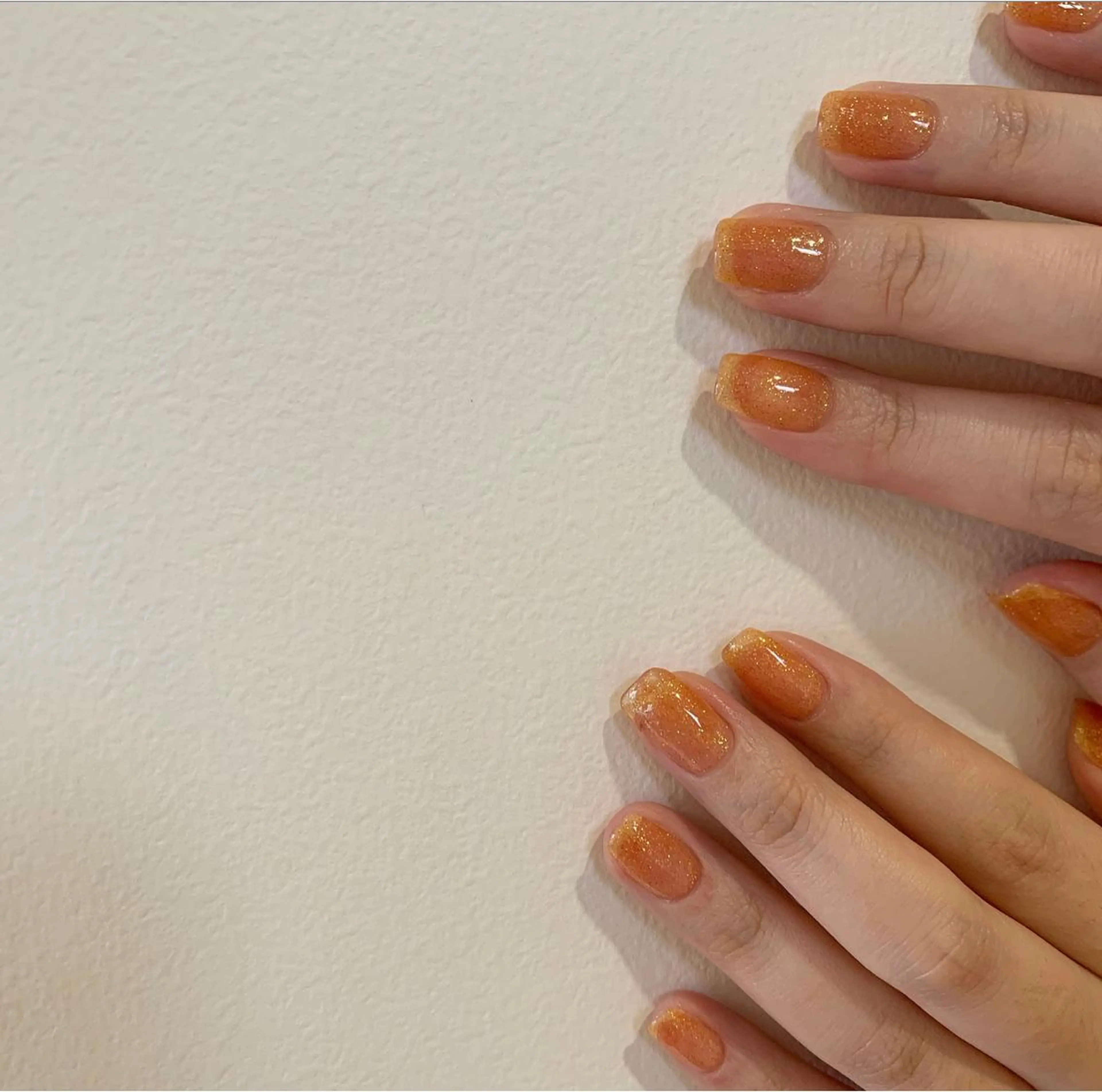ネイル クリアネイル ラメ(グリッター) オレンジ 佐藤 穂乃香のネイルデザイン