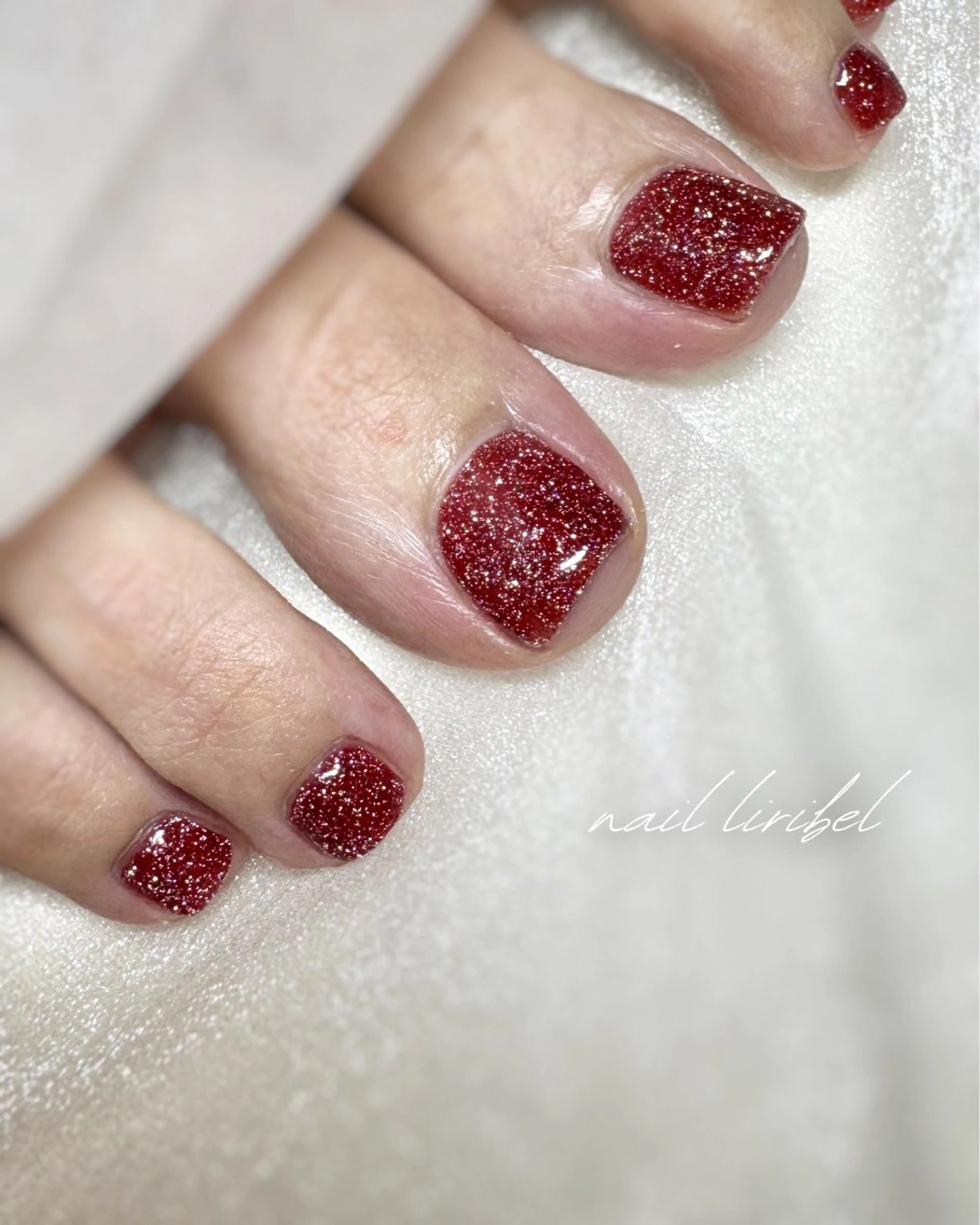 ネイル フラッシュネイル フットネイル キラキラネイル 赤色 フットネイル Nail Liribelのネイルデザイン