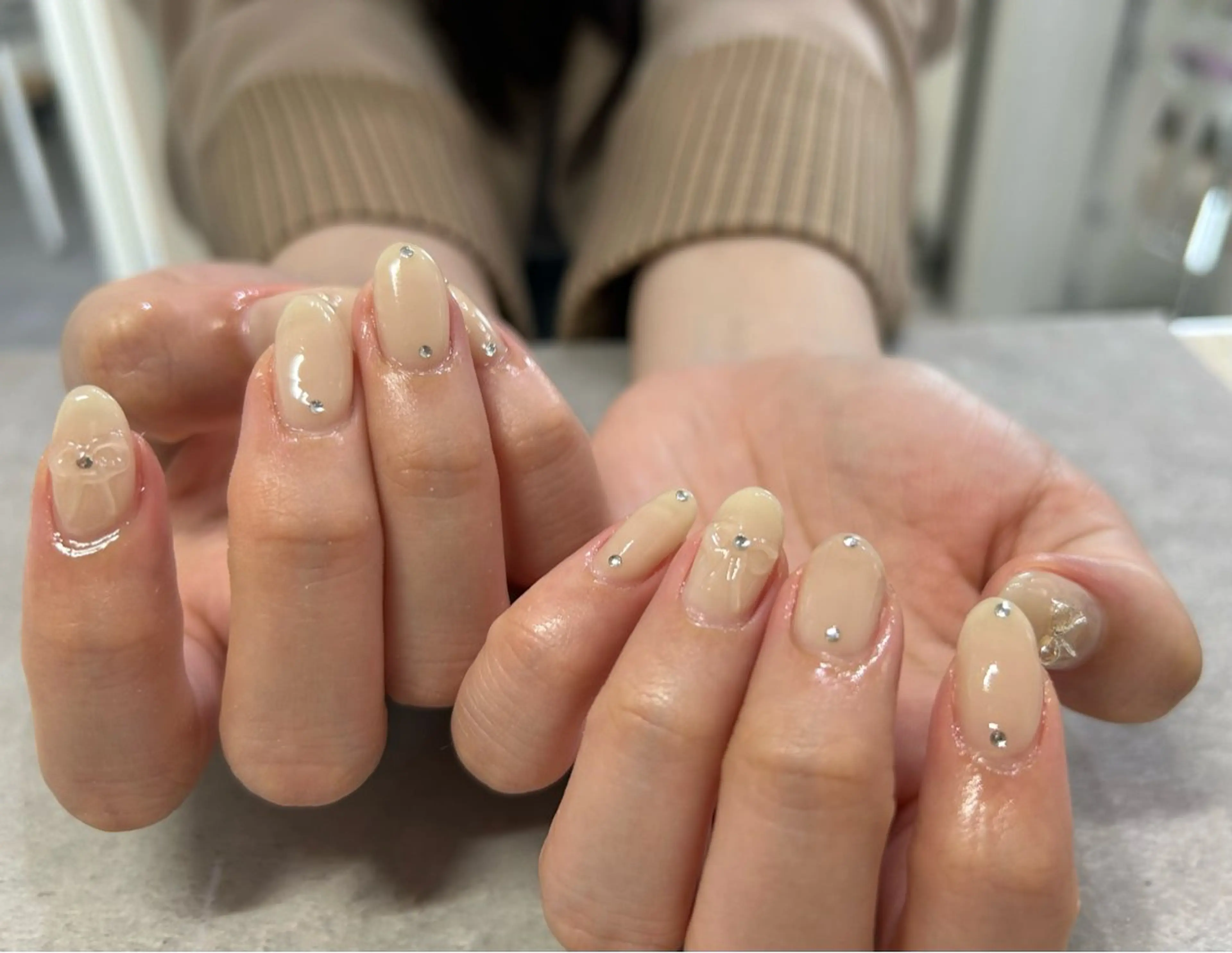 ネイル リボン 春ネイル Ray. byCharmeのネイルデザイン