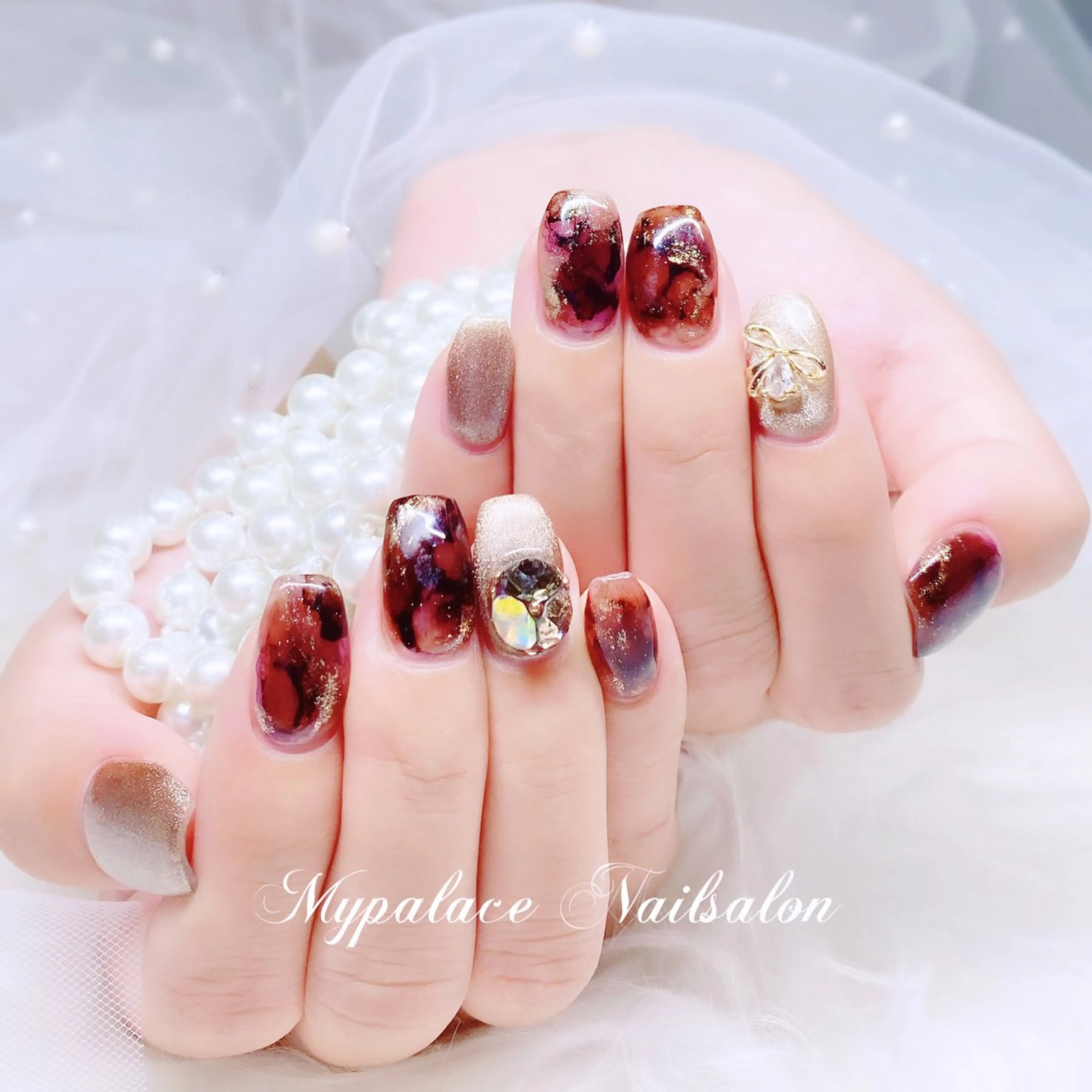 ネイル べっ甲ネイル マグネットネイル ニュアンスネイル リボン ストーンネイル ハンドネイル Yuis Nailスカルプ専門のネイルデザイン