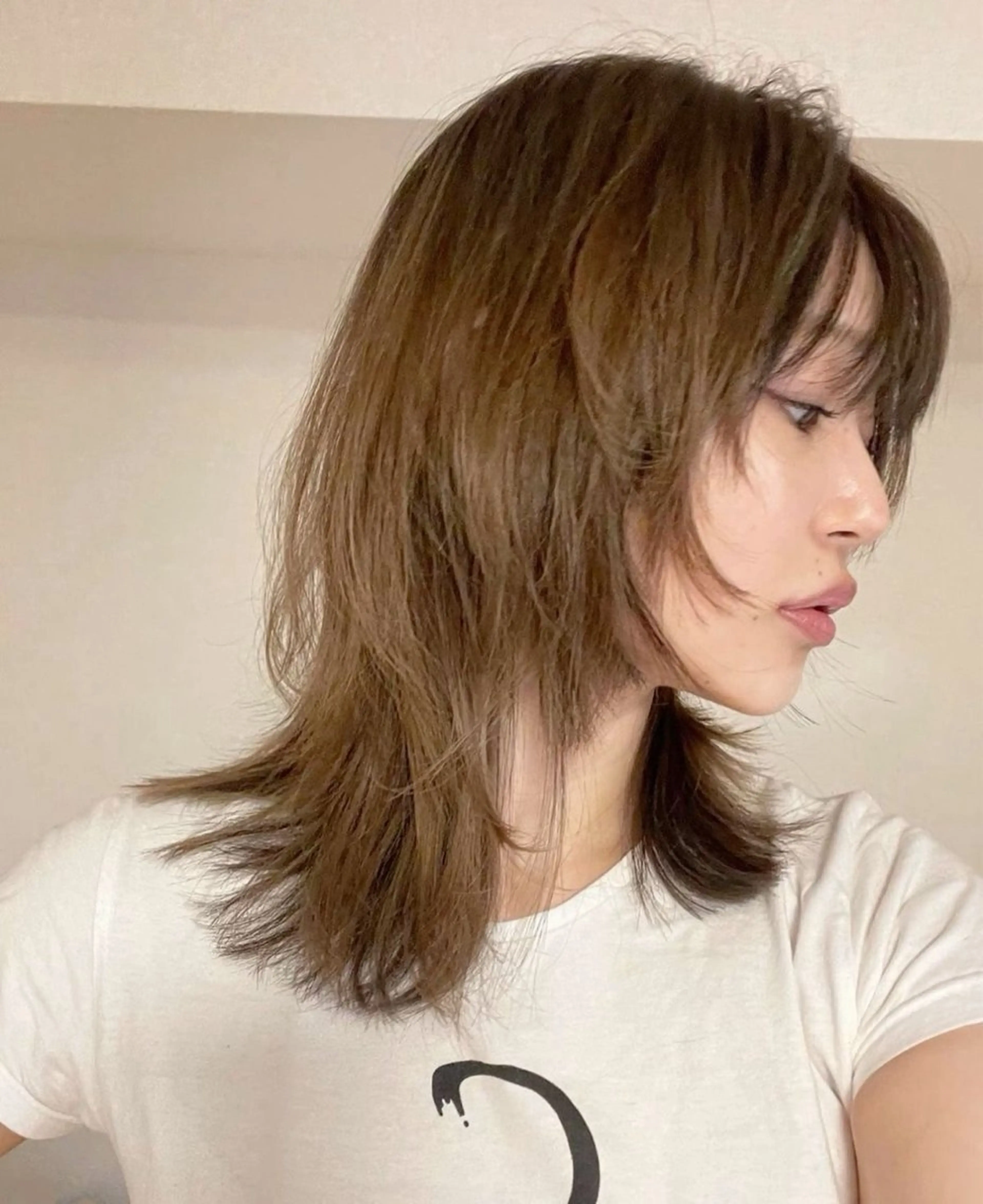 ミディアムレイヤーカット+艶トリートメントの写真