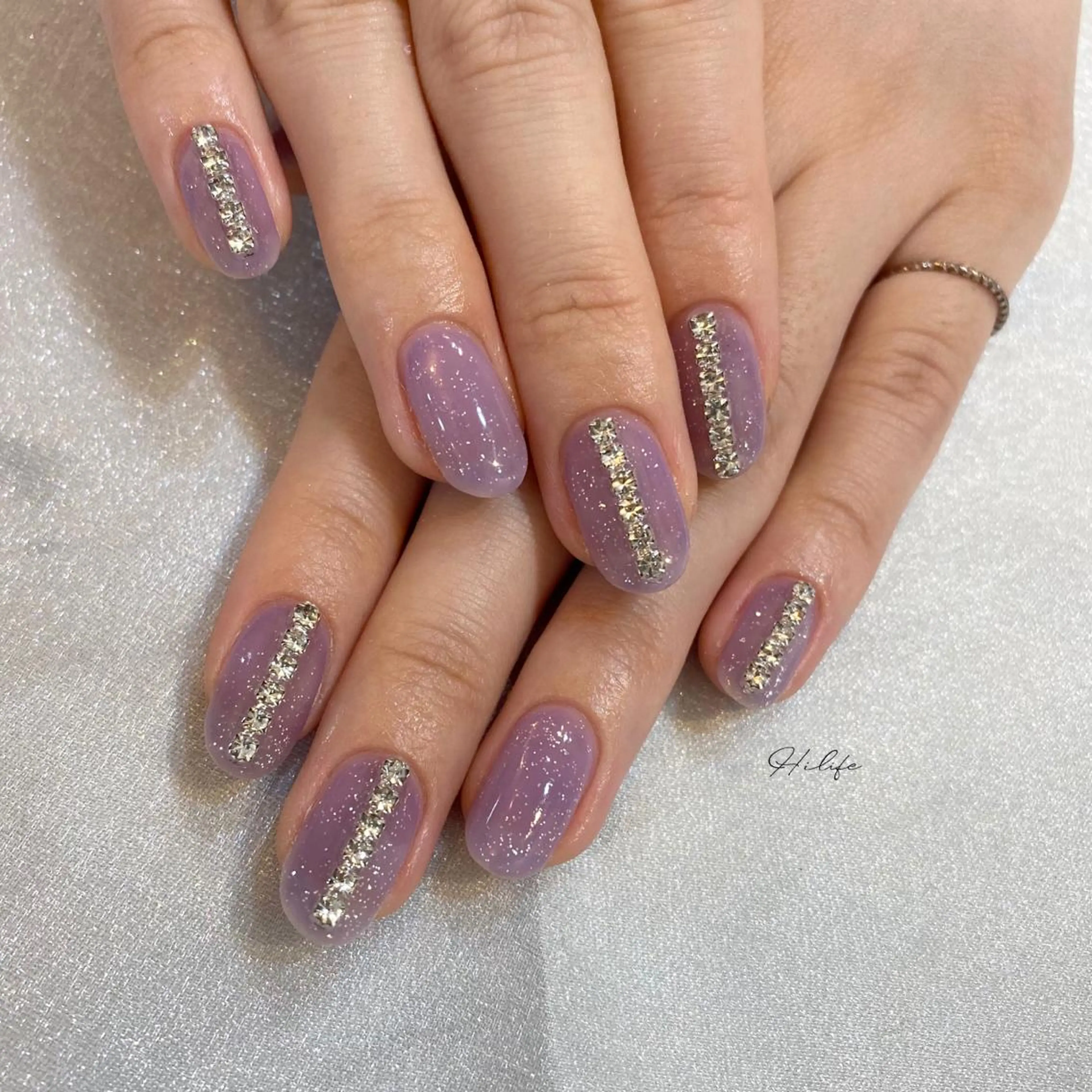 ネイル ラメ(グリッター) パープル ストーンネイル ネイルチップ ハンドネイル Nail Adore.のネイルデザイン