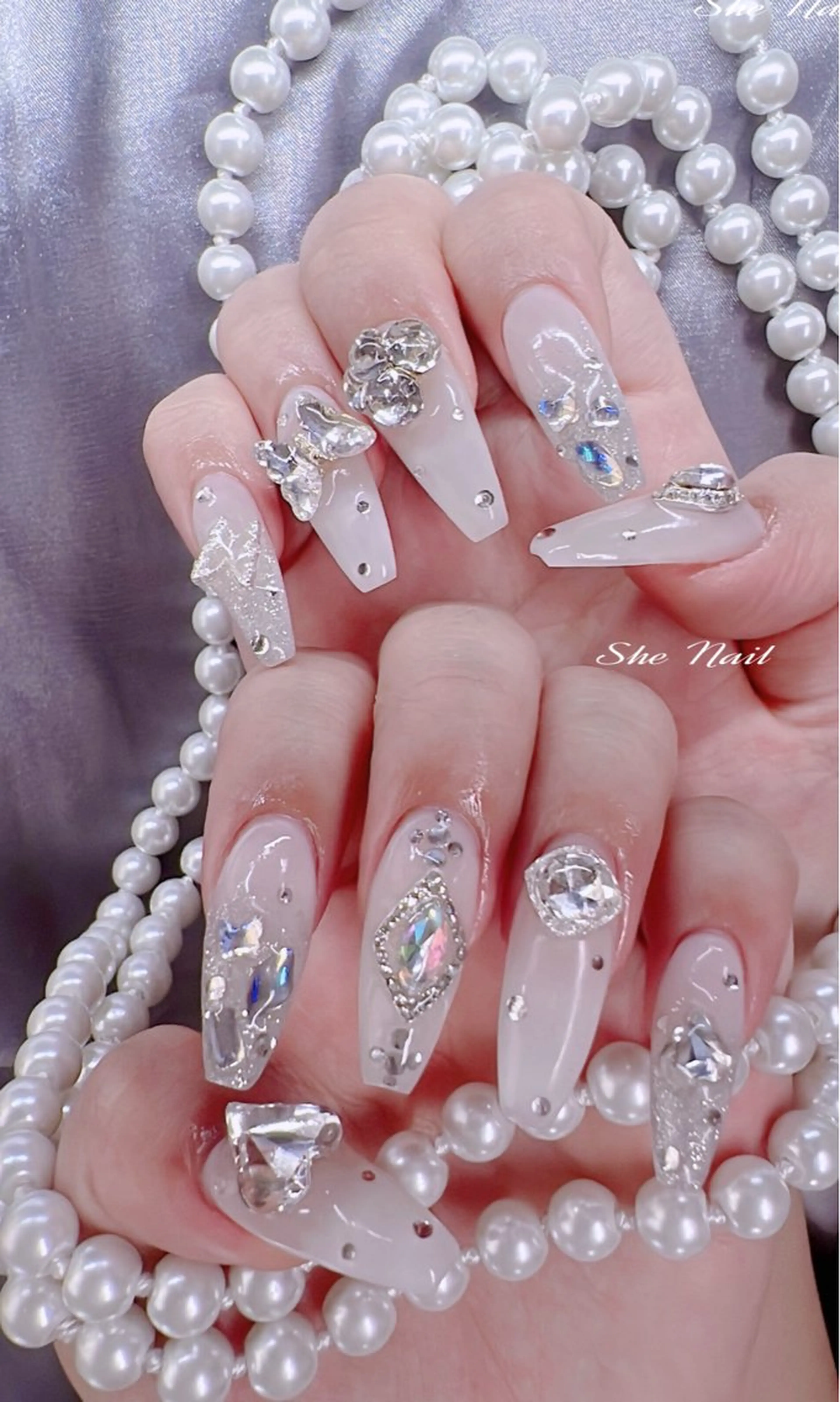 ネイル チークネイル 長さ出し フレンチネイル ハート キラキラネイル ハンドネイル She Nail所属・ISA_ BELLAのネイルデザイン