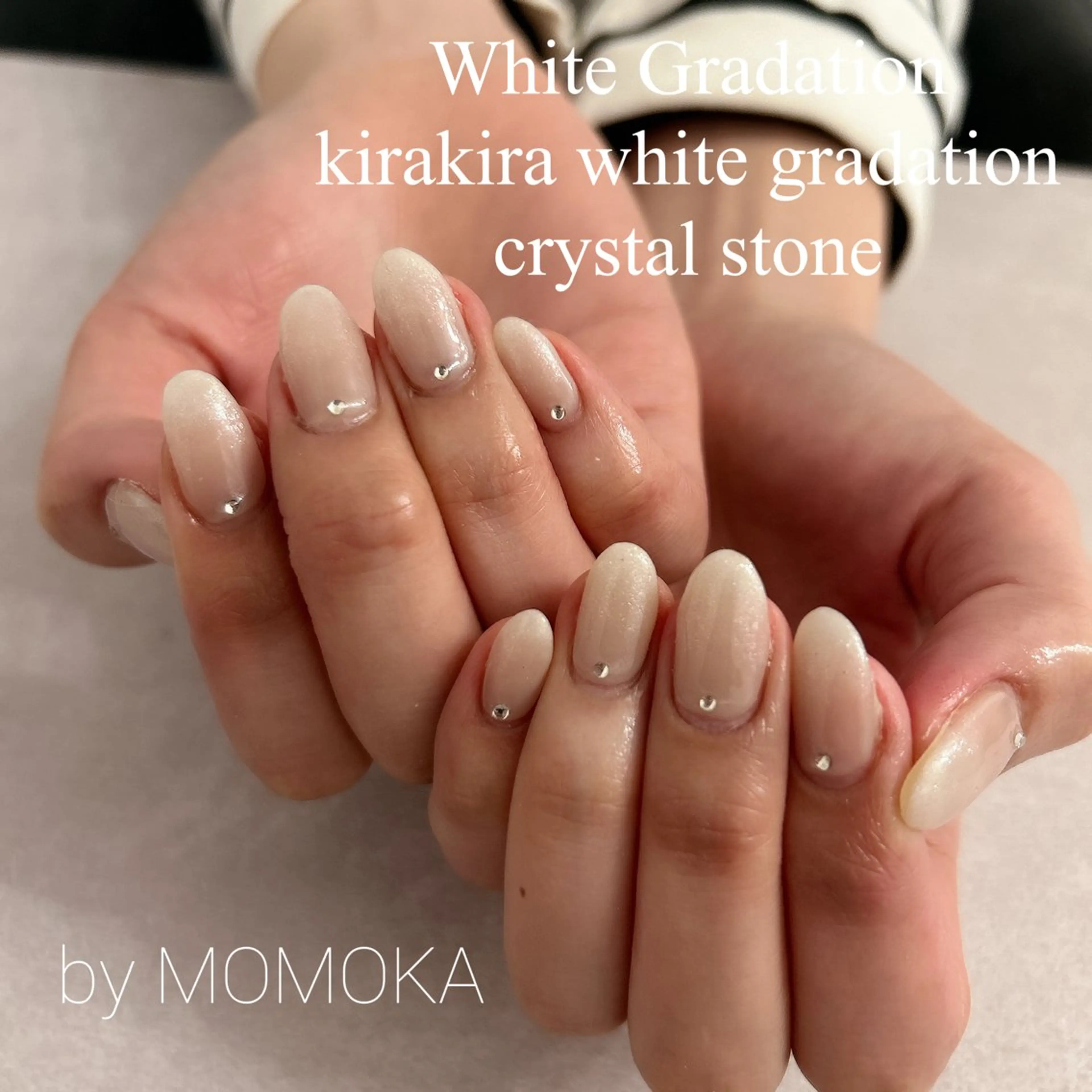 ネイル グラデーション キラキラネイル ホワイト ハンドネイル momoka_nails所属・Momo Nailsのネイルデザイン
