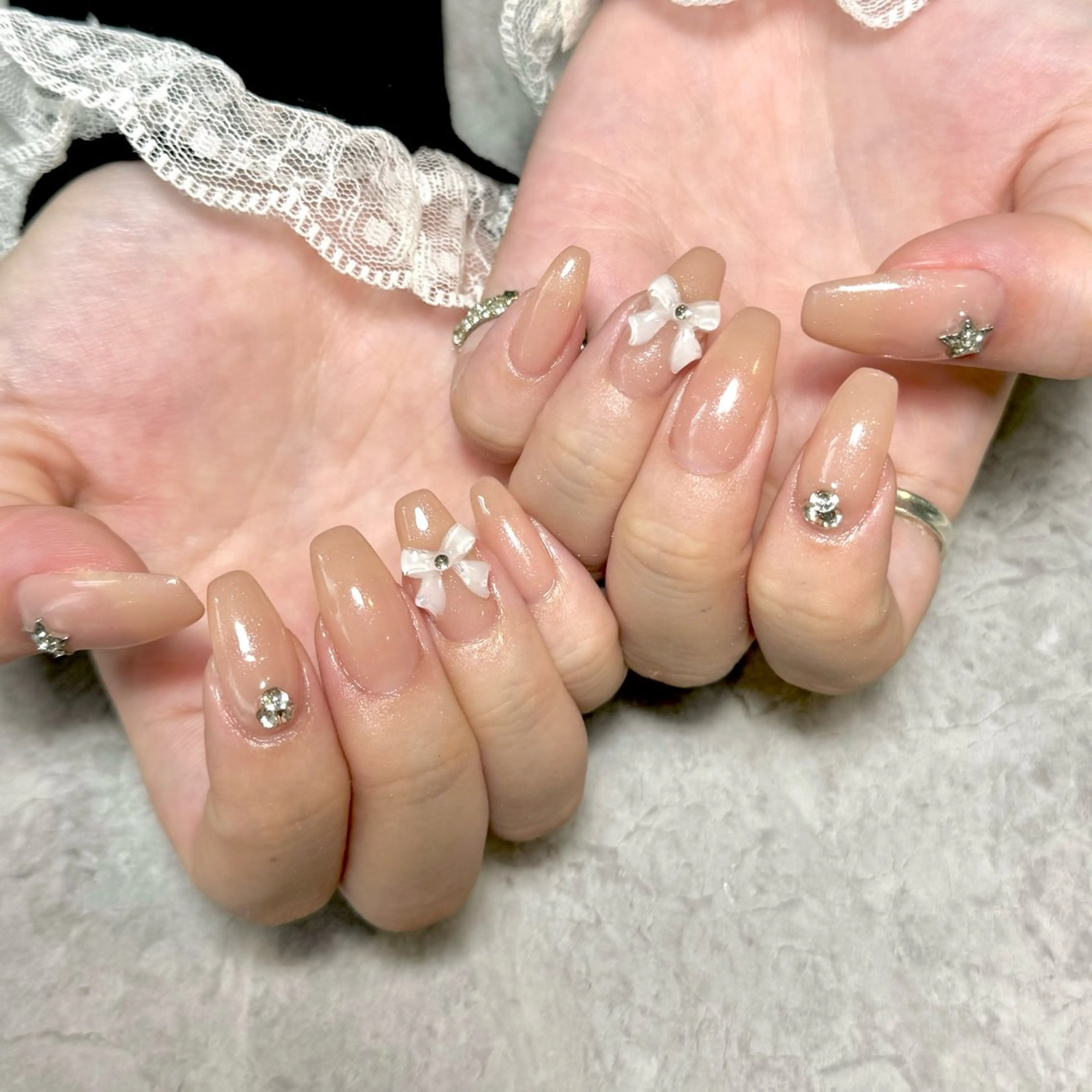 ネイル キラキラネイル リボン ハンドネイル Nail Salon Lillion【リリオン】所属・lillion karenのネイルデザイン