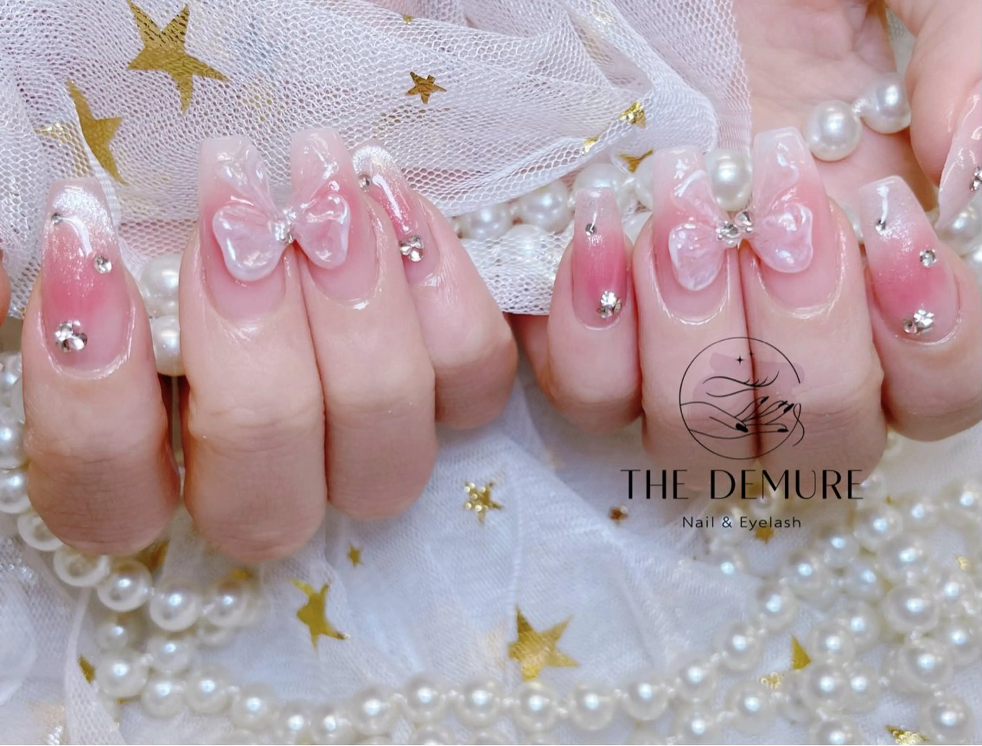 ネイル アートネイル キラキラネイル 韓国ネイル 水色 ロングネイル ハンドネイル ハンドケア NailDemure 【銀座店】のネイルデザイン