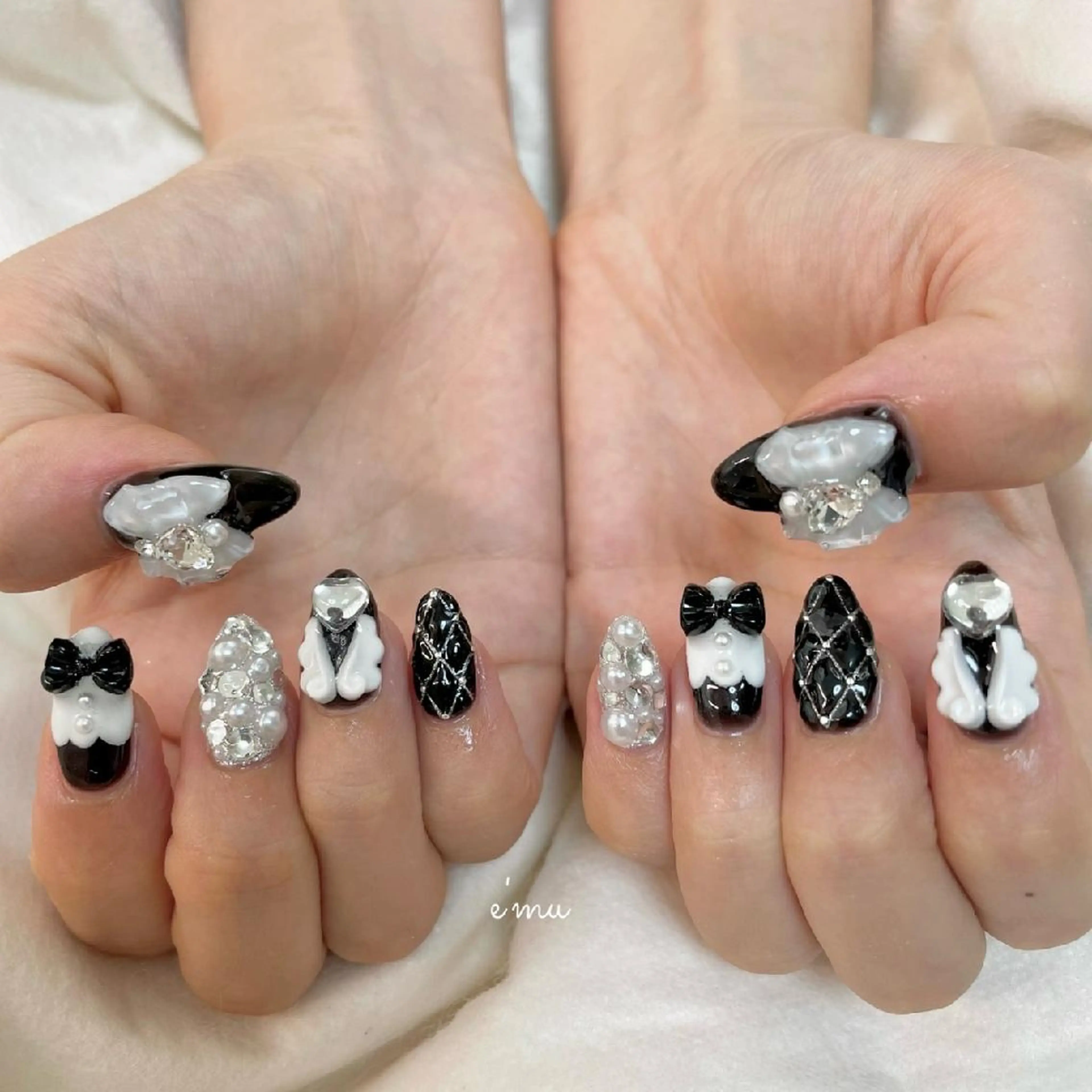 ネイル ガーリー リボン nail salon e'mu💐のネイルデザイン
