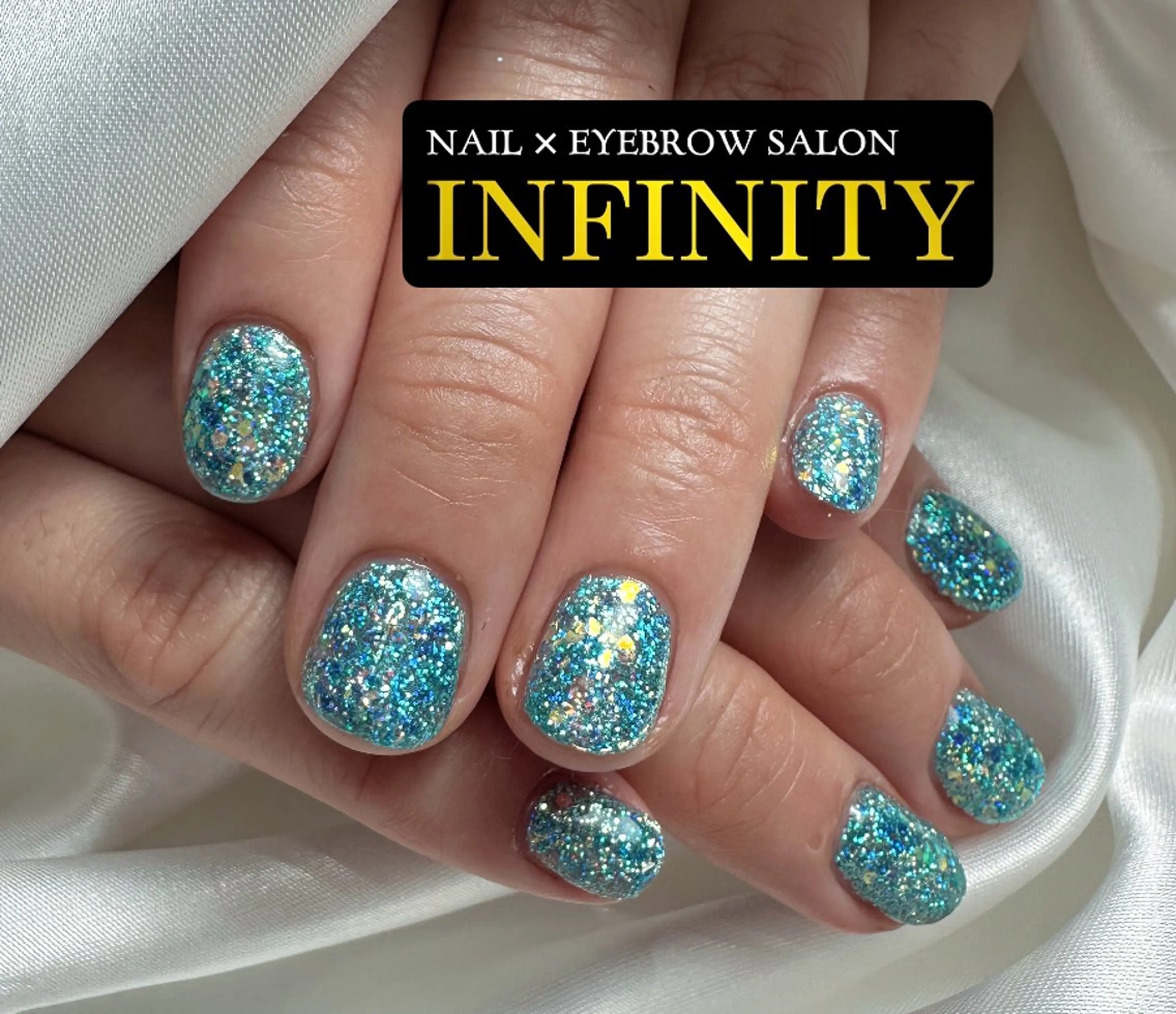 ネイル キラキラネイル 水色 INFINITY所属・INFINITY 💎のネイルデザイン