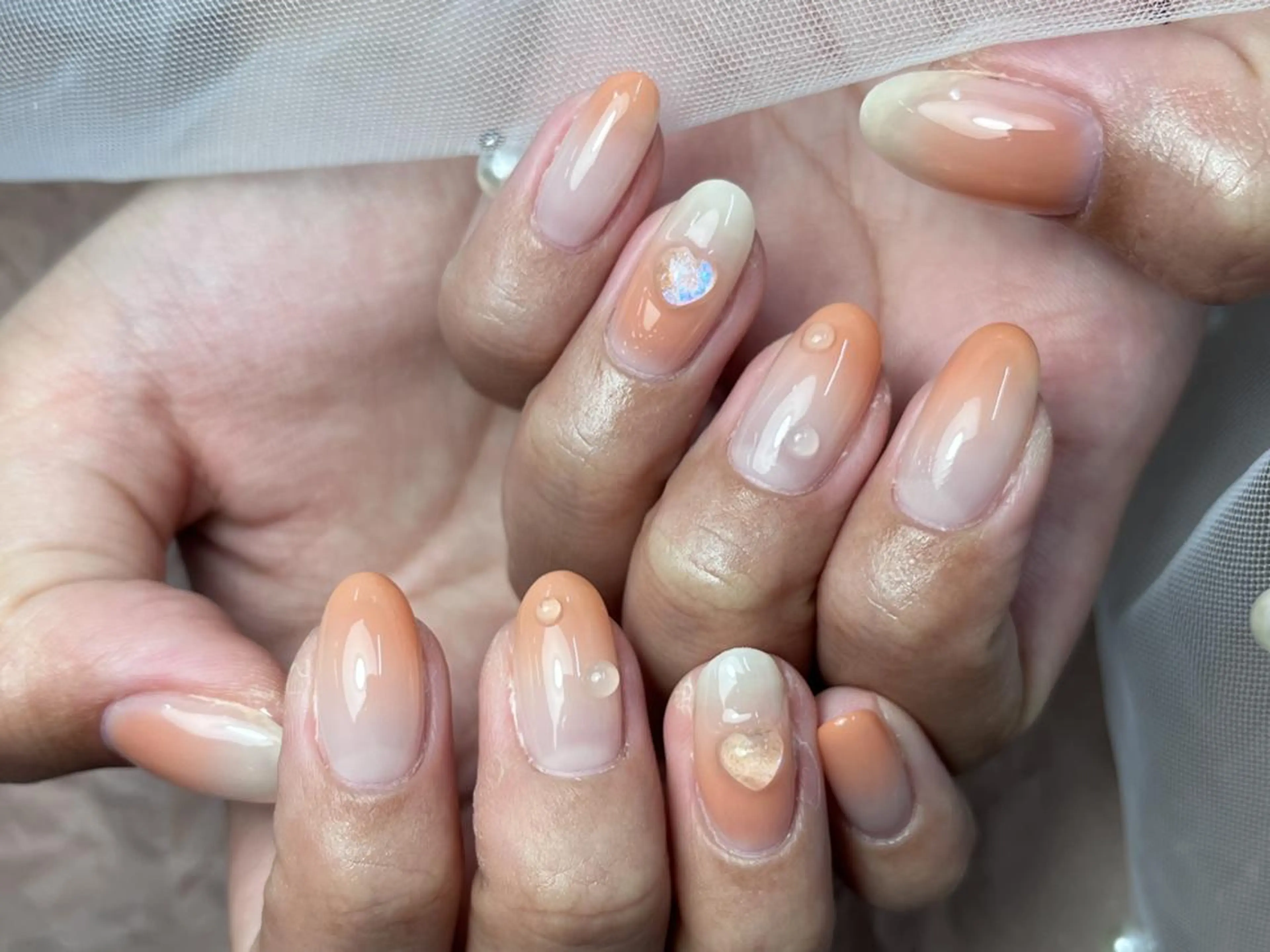 ネイル ドット グラデーション ハート オレンジ ハンドネイル ハンドケア ToliyDeliy Nail Salonのネイルデザイン
