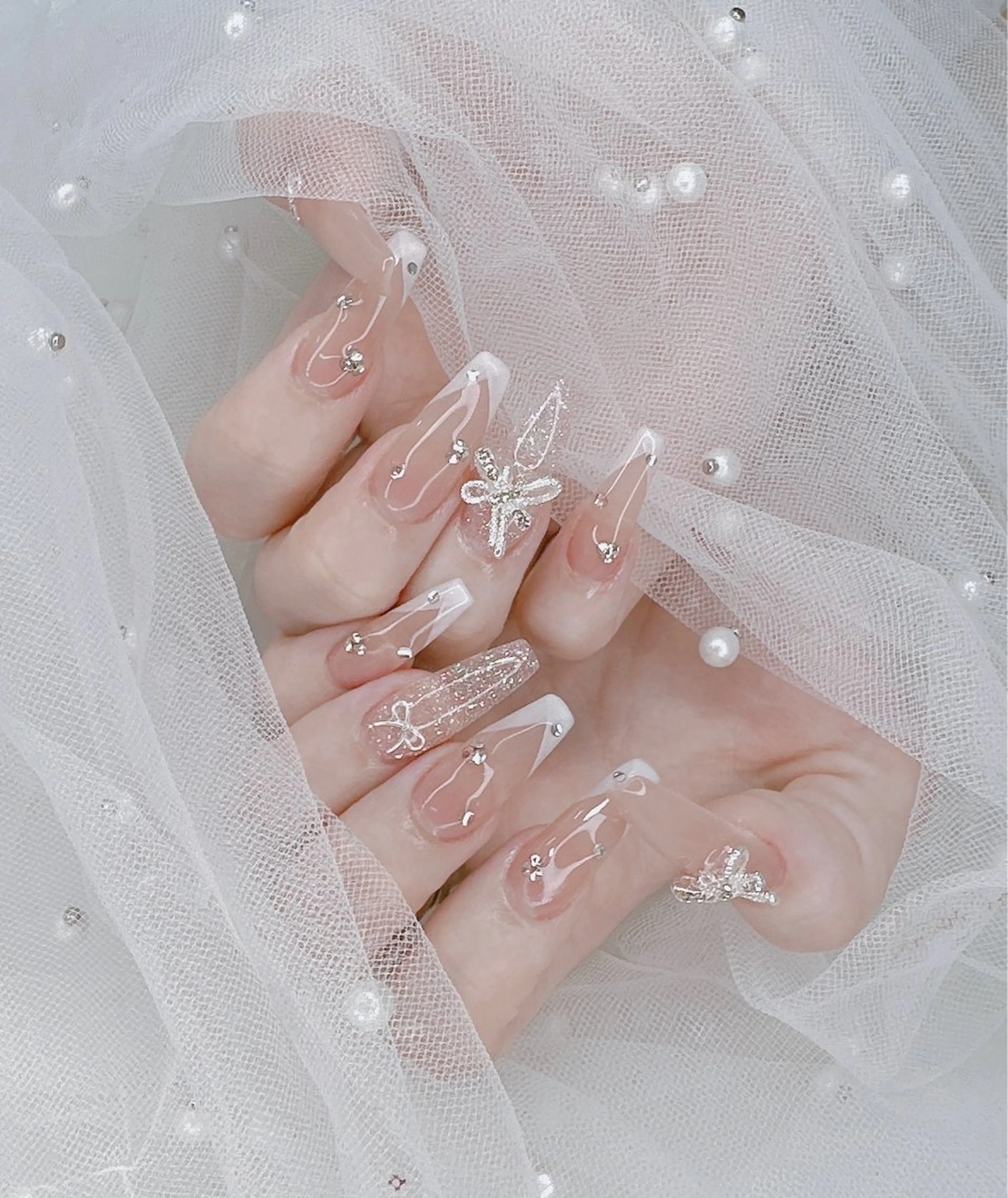 ネイル リボン R nailsalon所属・R salonのネイルデザイン