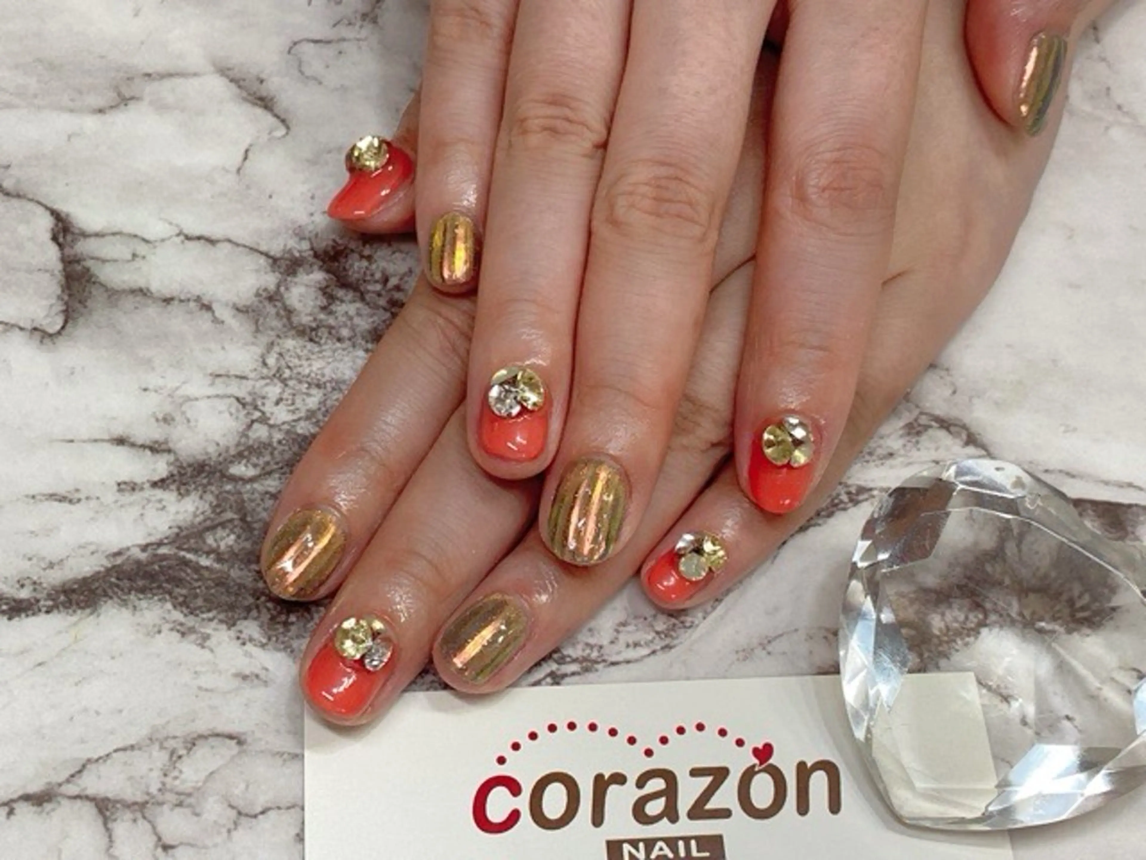 ネイル オレンジ ストーンネイル corazon所属・ネイリスト aicoのネイルデザイン