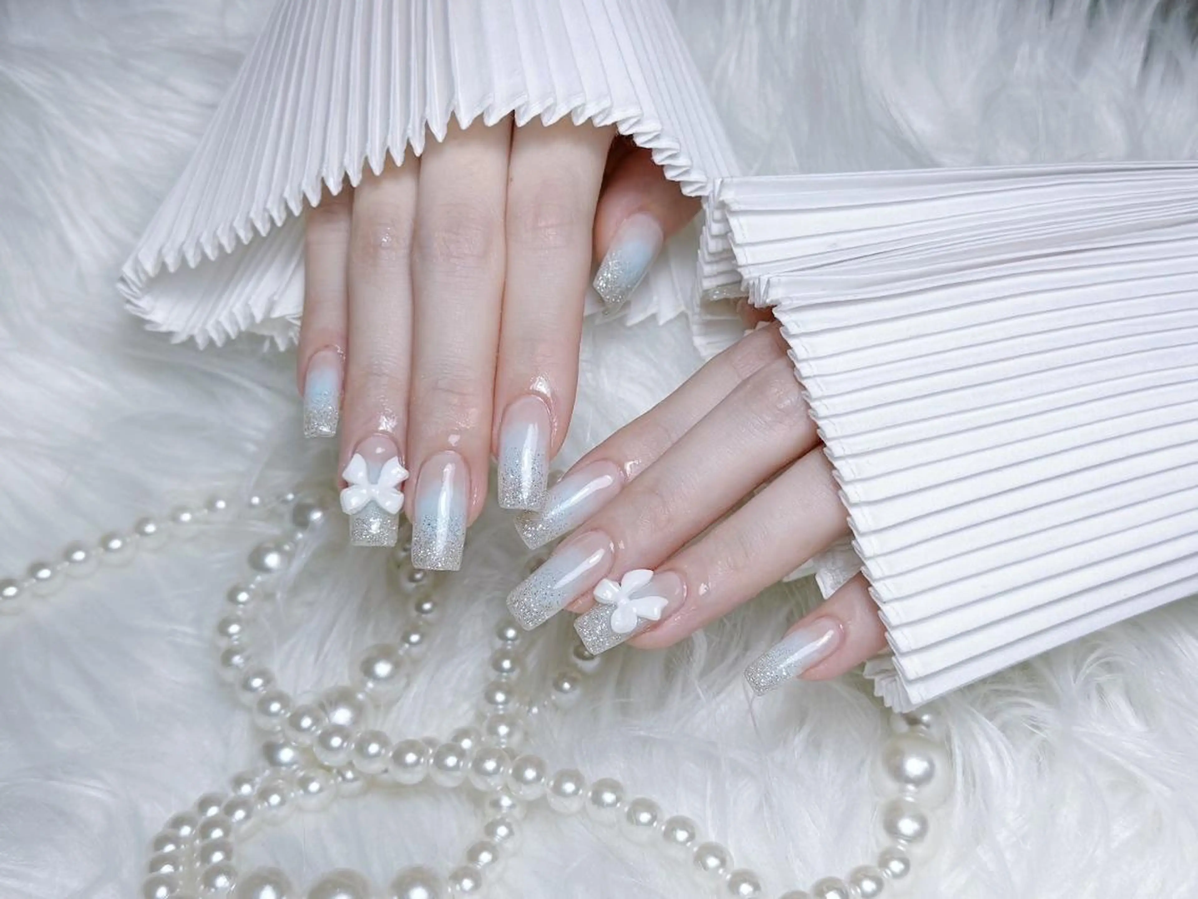 ネイル RAFFINE 月🦋🩵のネイルデザイン