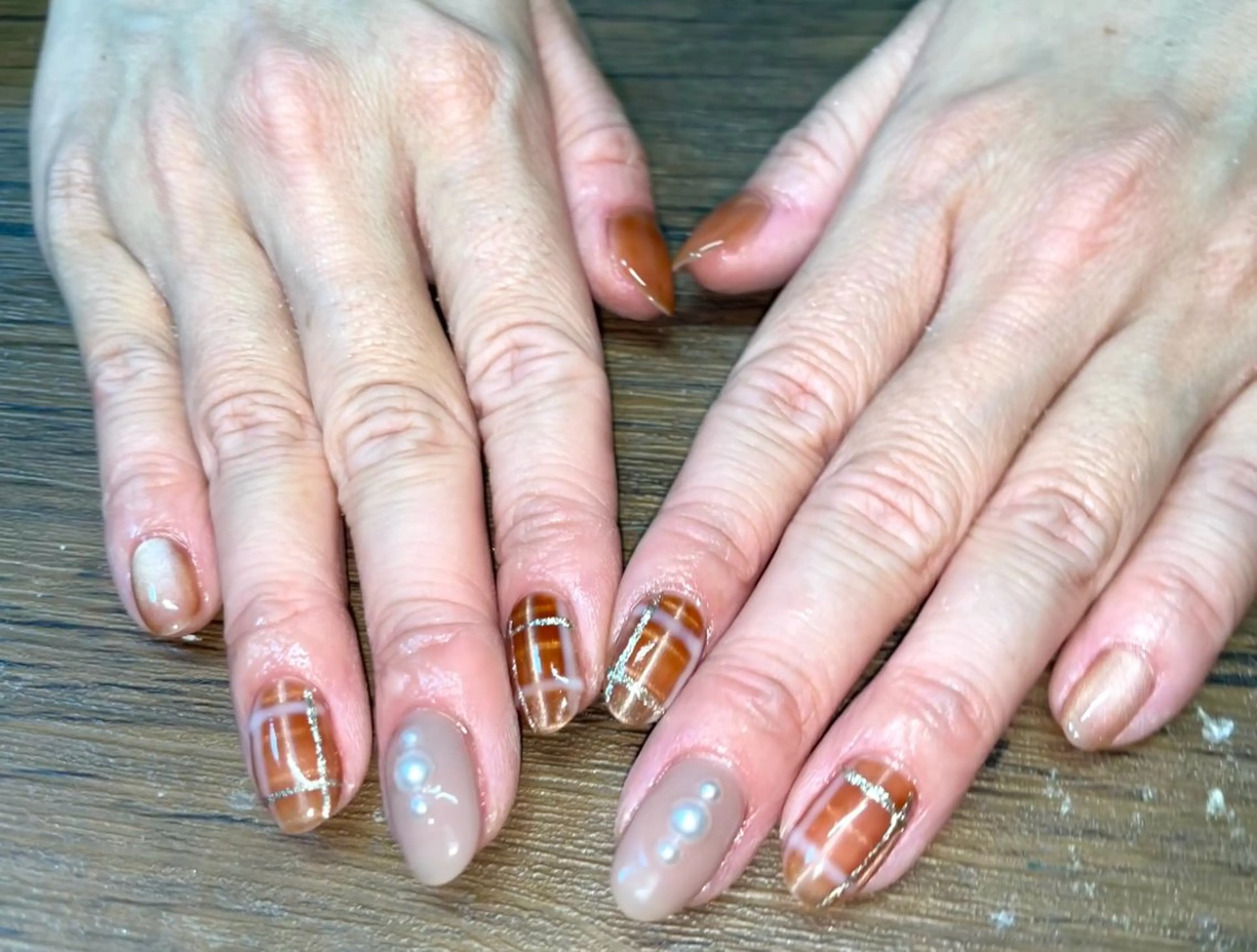 💎オフ+マグネットチェックネイル🍂の写真