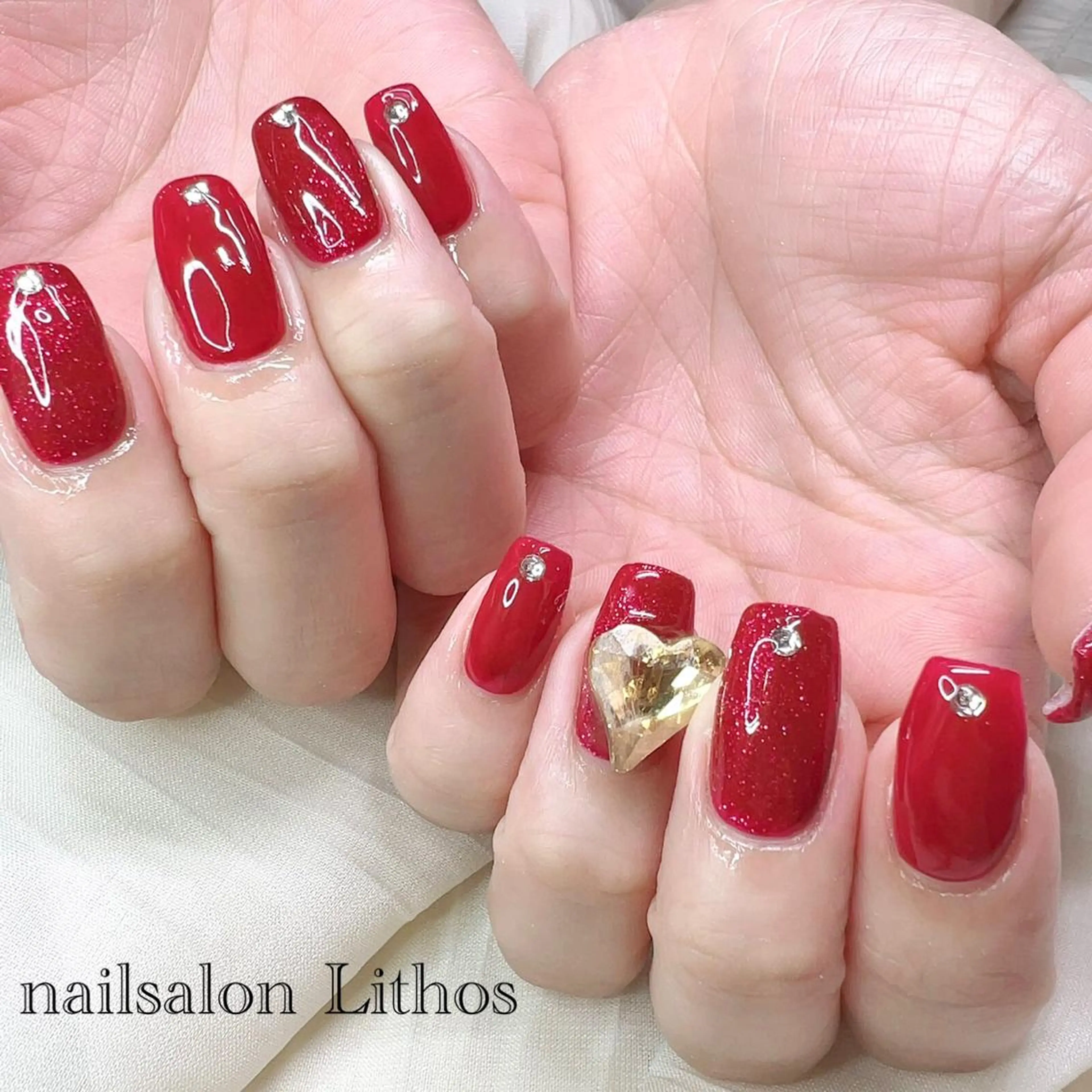 ネイル 赤色 ハンドネイル nailsalon Lithos所属・nailsalon Recontreのネイルデザイン