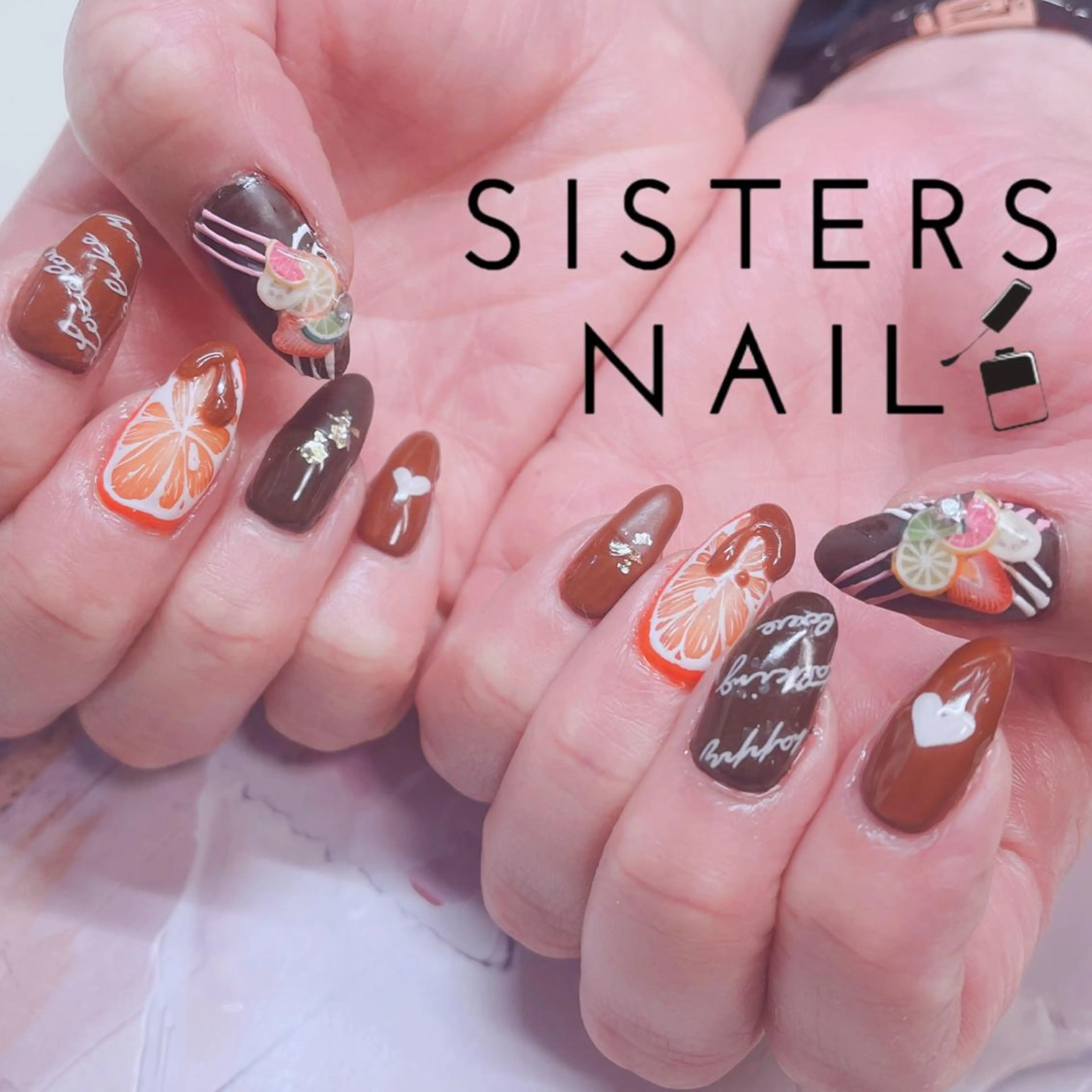 ネイル アートネイル ハート オレンジ バレンタイン 冬ネイル ハンドネイル ハンドケア sisters nail.fのネイルデザイン