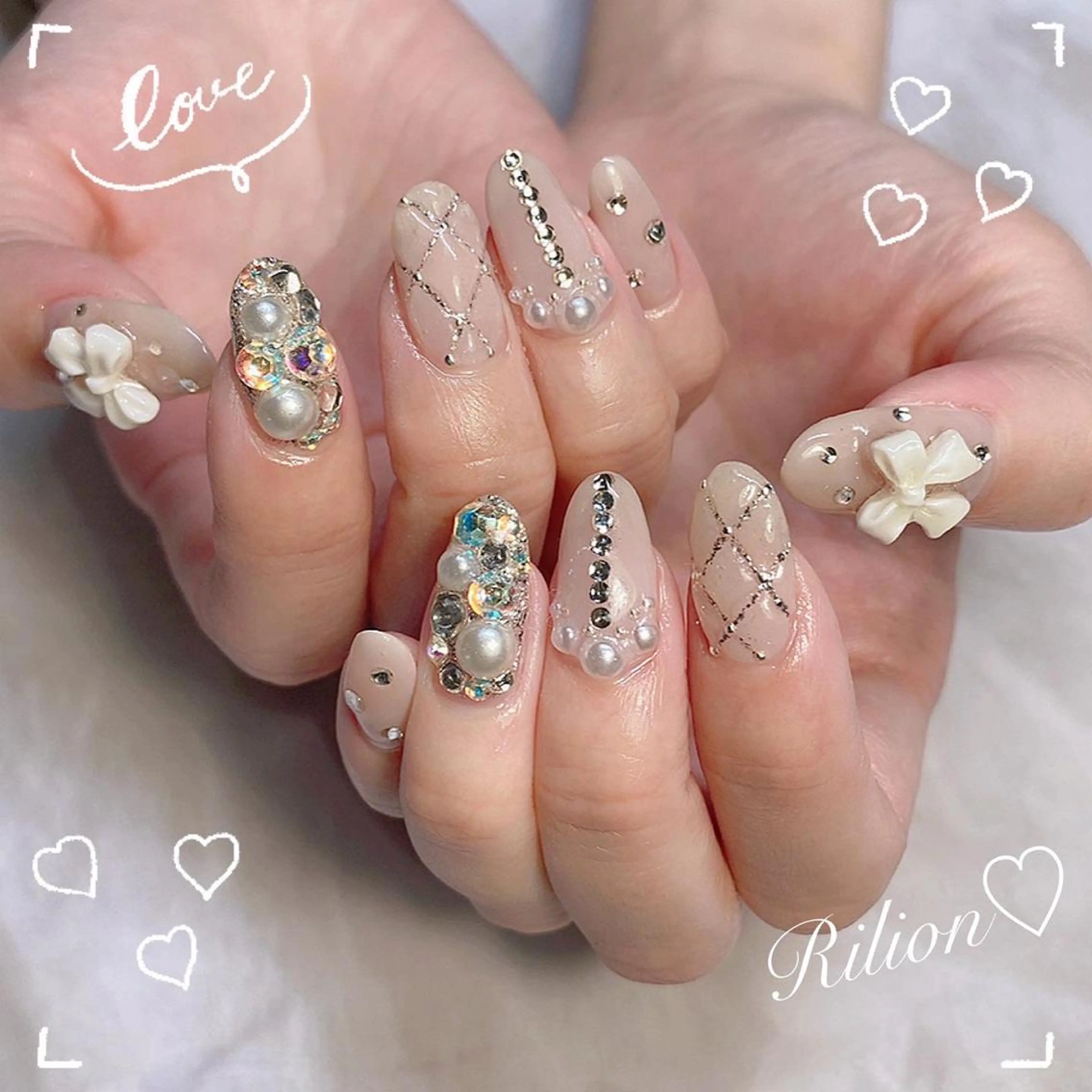 ネイル アートネイル リボン ハンドネイル RiLion💗 Risa🦋💜のネイルデザイン