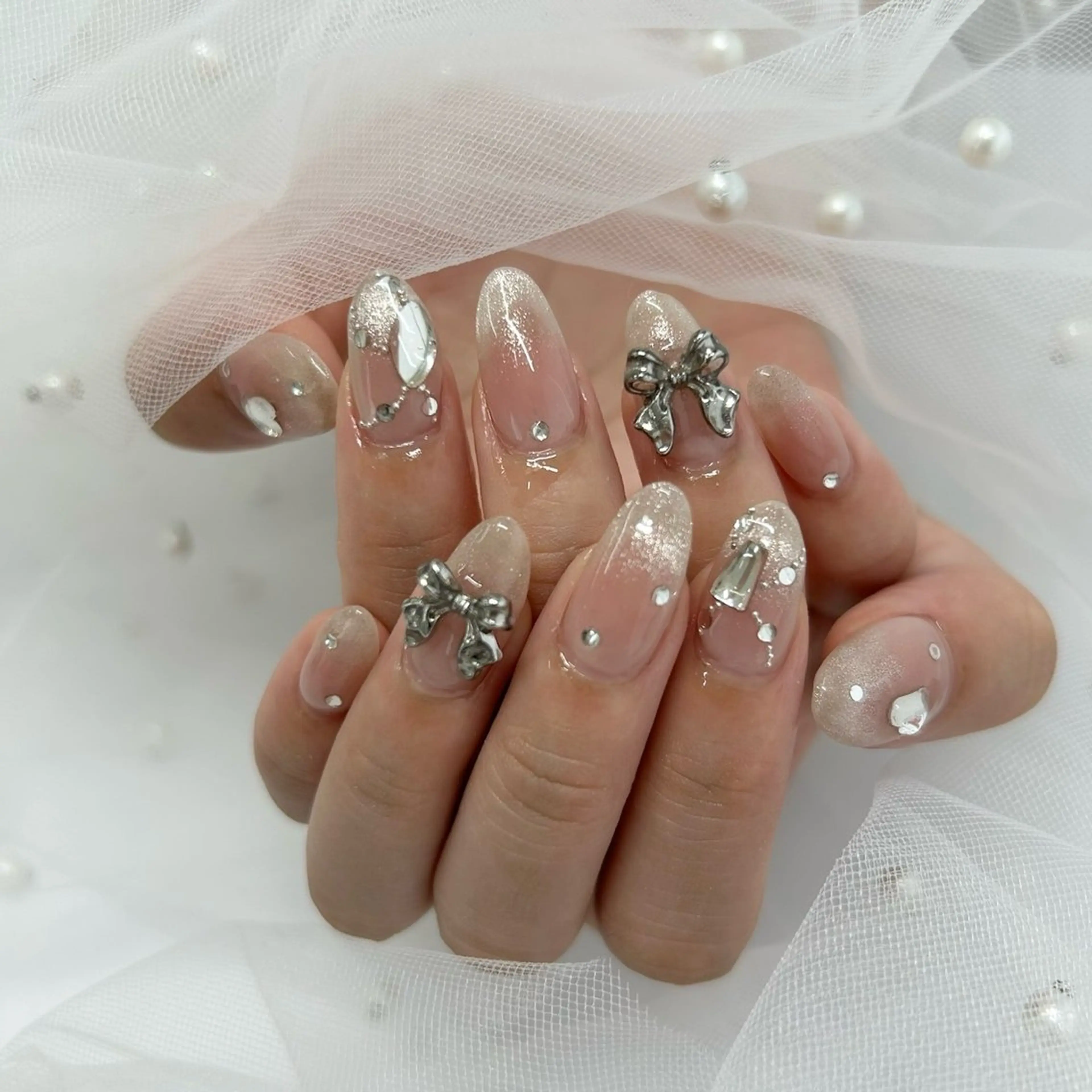 ネイル チークネイル グラデーション マグネットネイル リボン ワンホンネイル ハンドネイル nailsalon meteor所属・meteor staffのその他イメージ