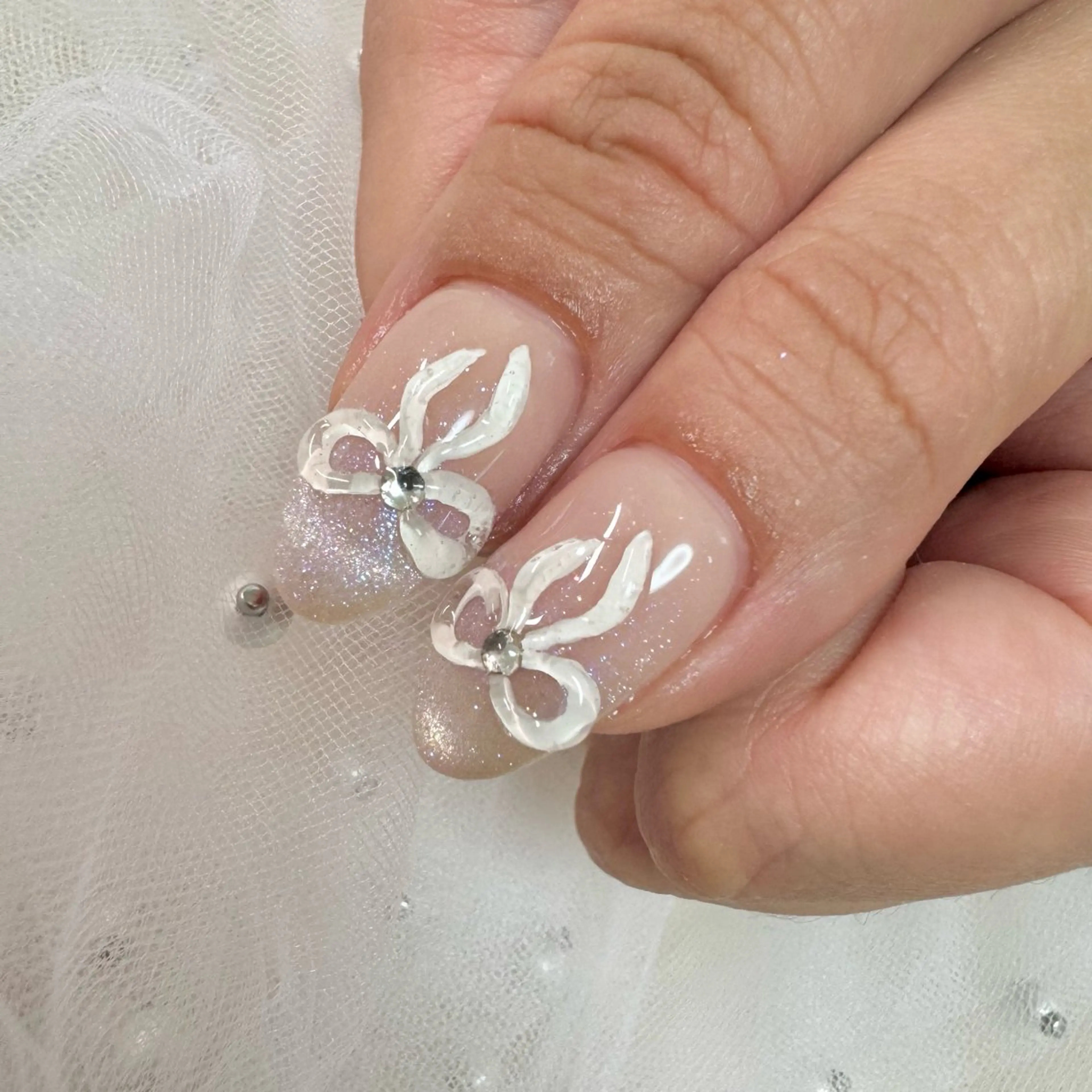ネイル リボン ハンドネイル nail salon e'mu💐のネイルデザイン