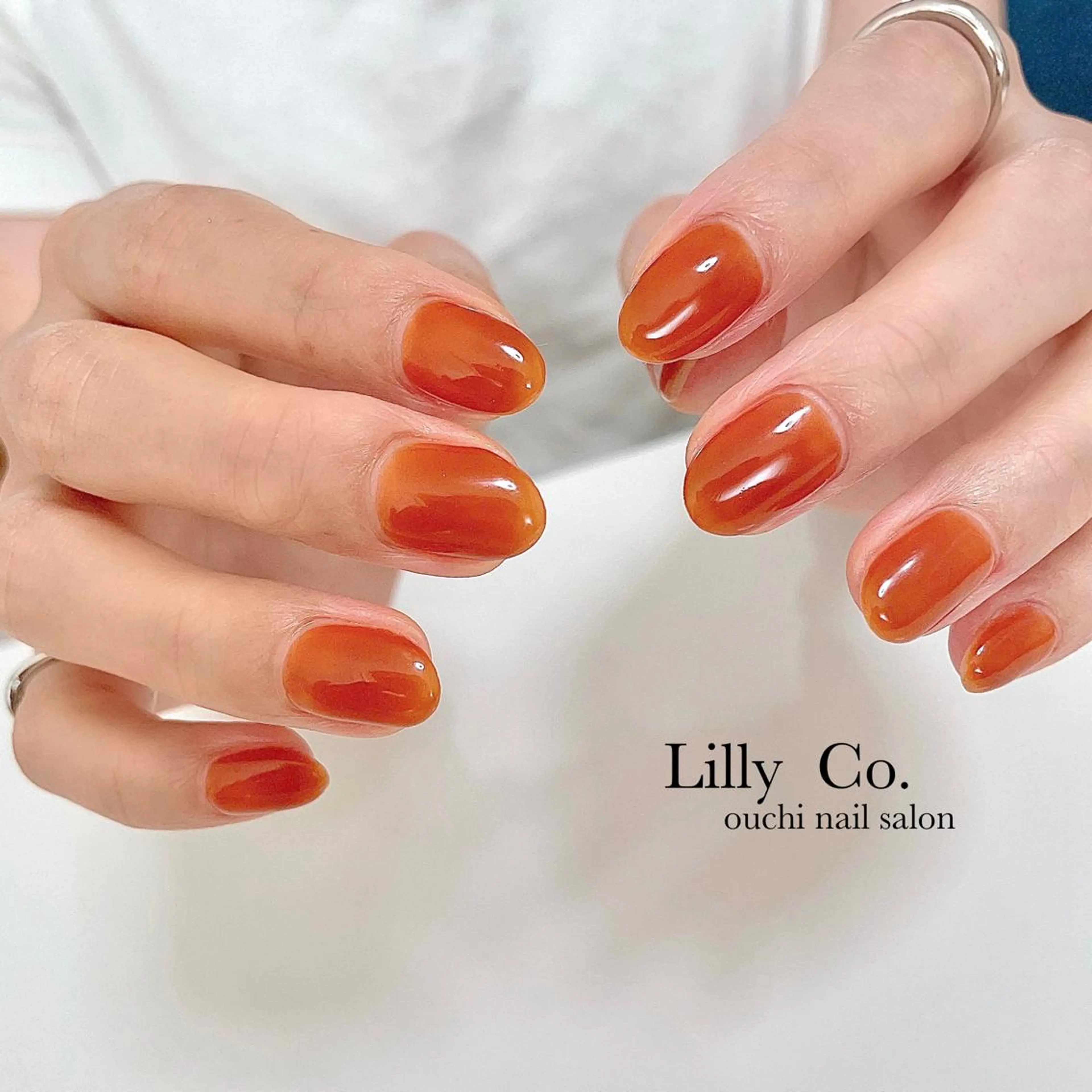 ネイル オレンジ ハンドネイル ハンドケア Lilly Co.のネイルデザイン
