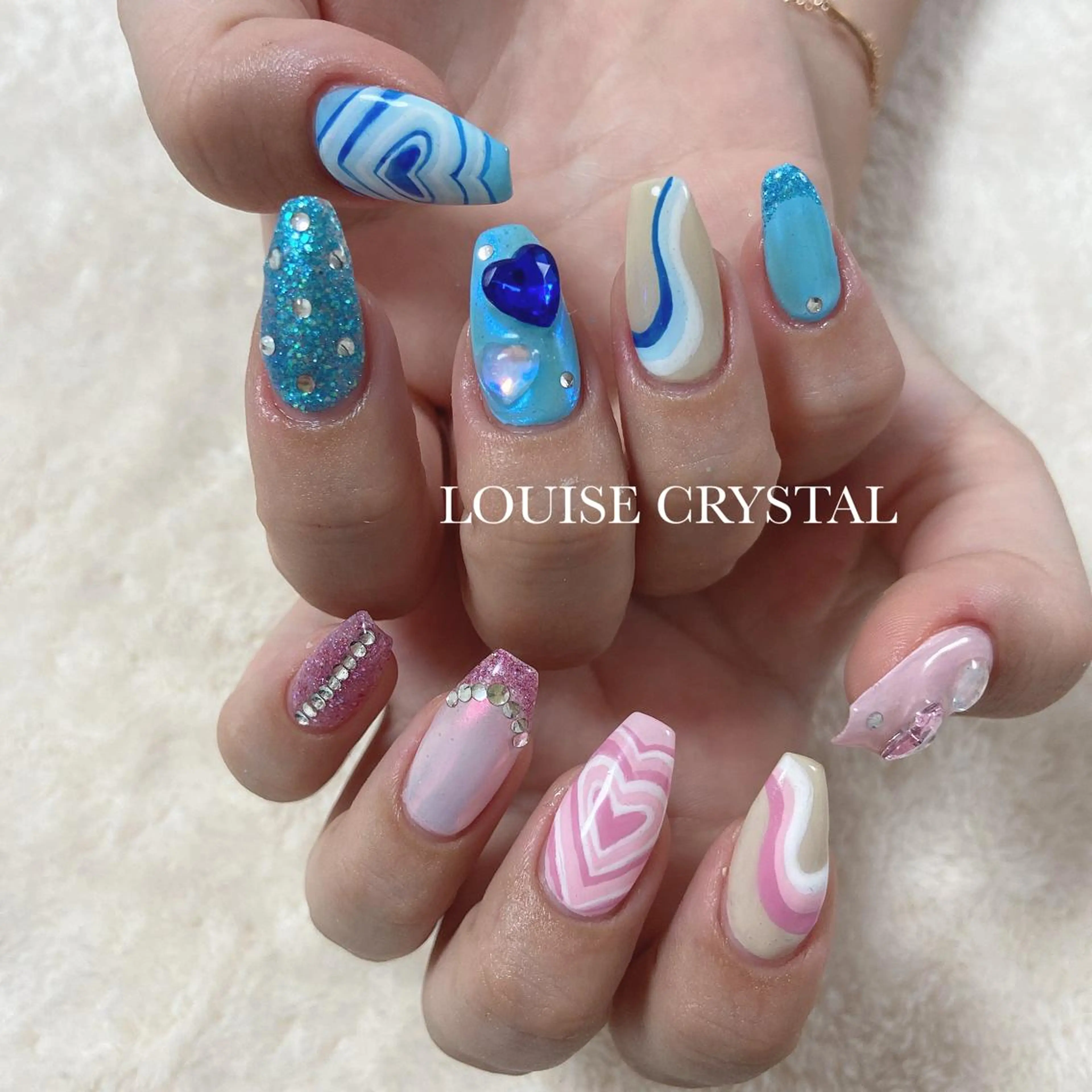 ネイル ハンドネイル LOUISE CRYSTALのネイルデザイン