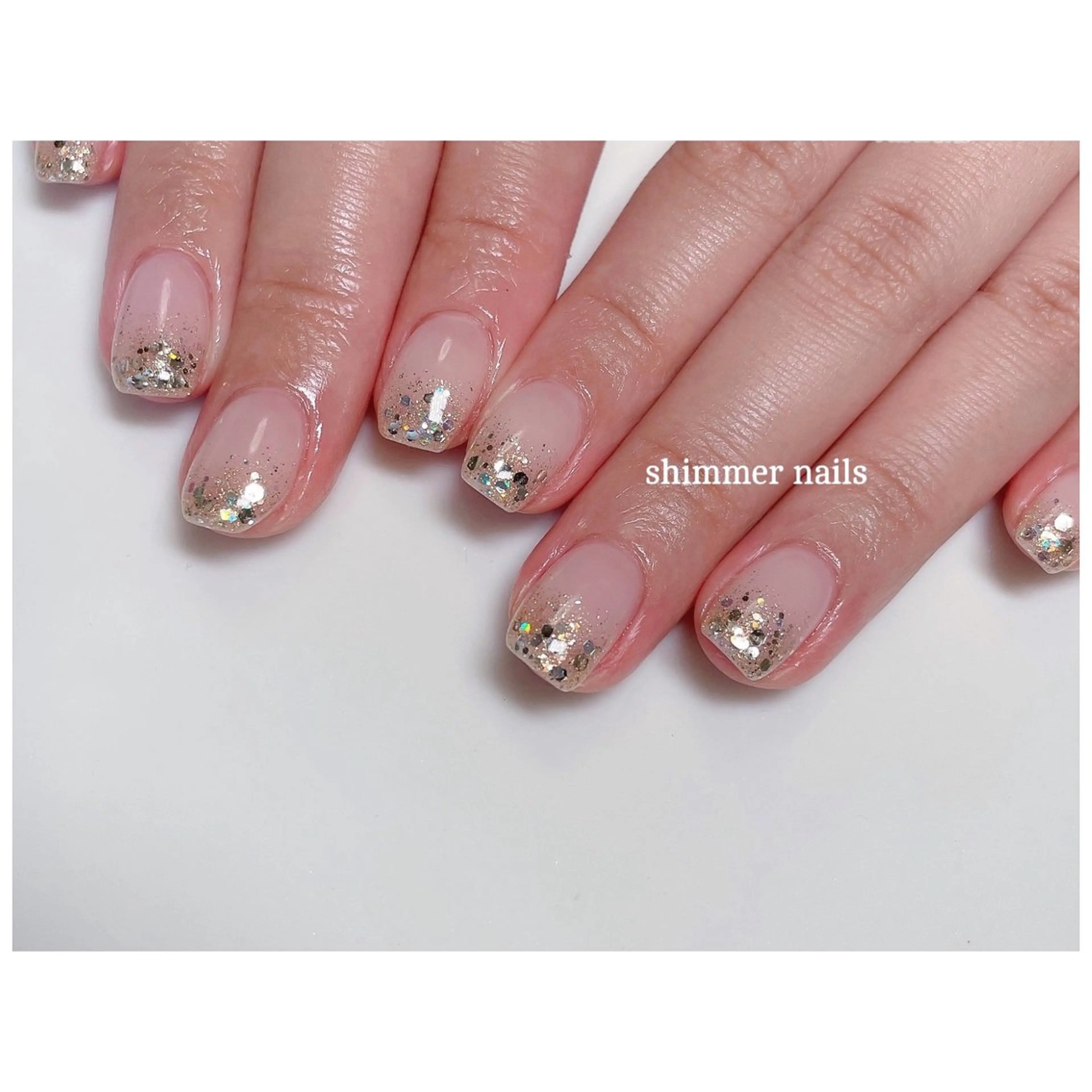ネイル クリアネイル ゴールド ラメ(グリッター) ホワイト shimmer nailsのネイルデザイン