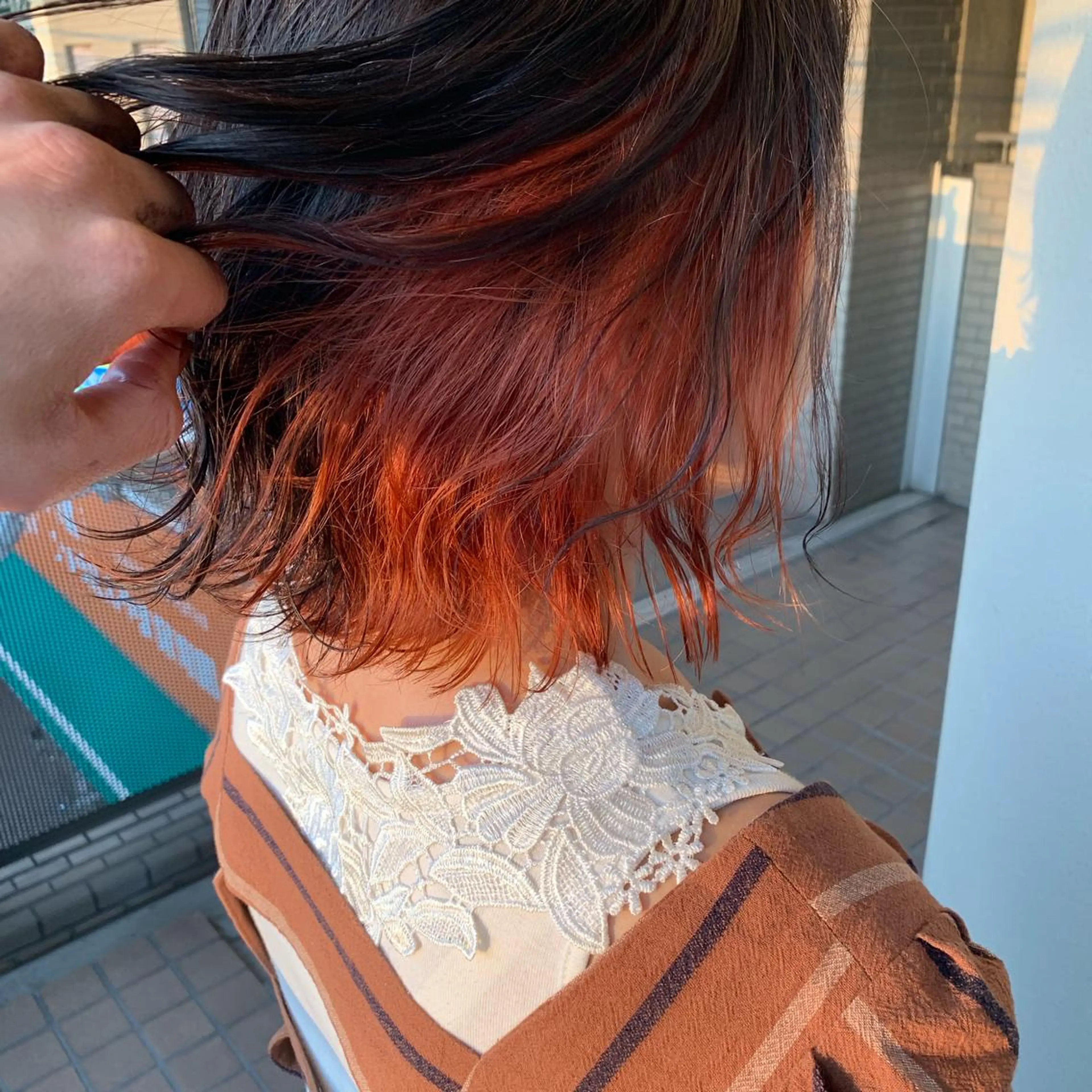 カラー ブリーチ インナーカラー オレンジ ヘアカラー トリートメント 本町/心斎橋/北堀江 透明感カラーSANCのヘアスタイル