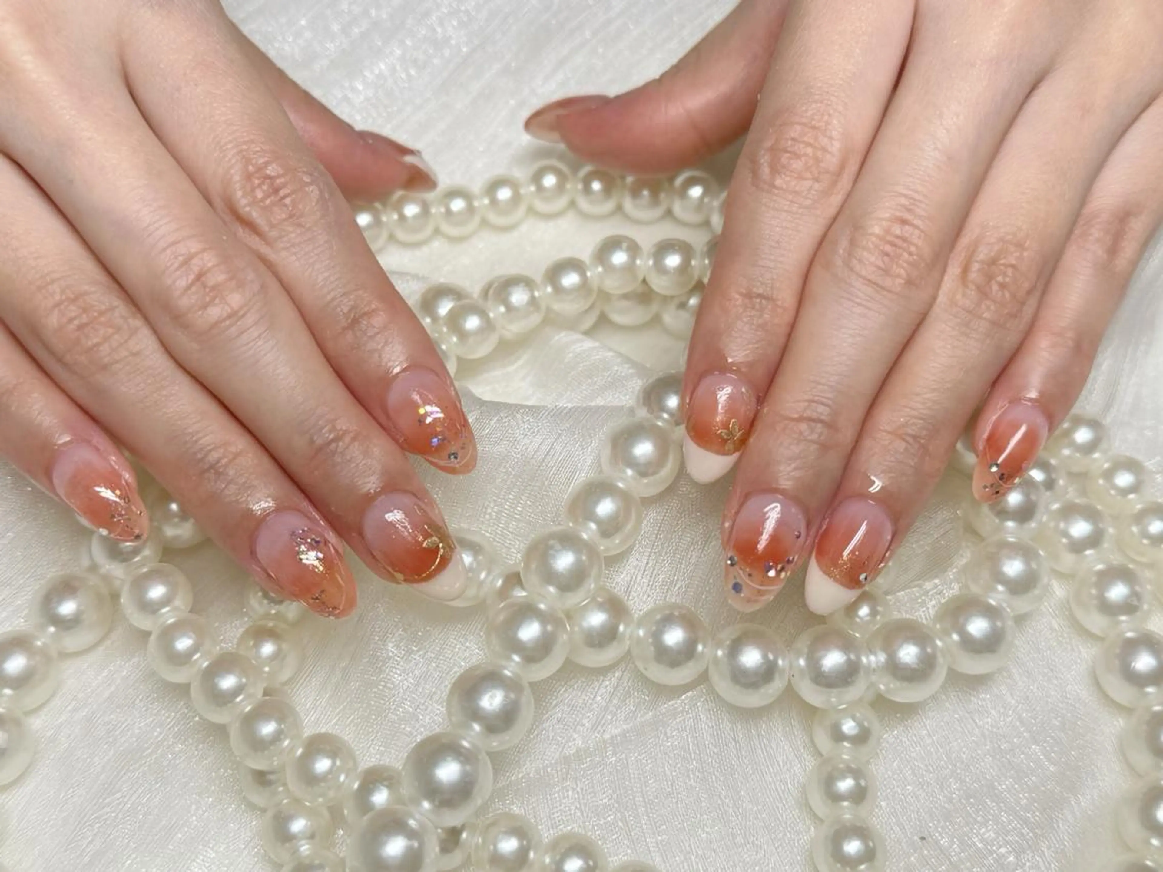 ネイル オーロラネイル 長さ出し フレンチネイル ガーリー キラキラネイル ハンドネイル Lucky nail salonのネイルデザイン