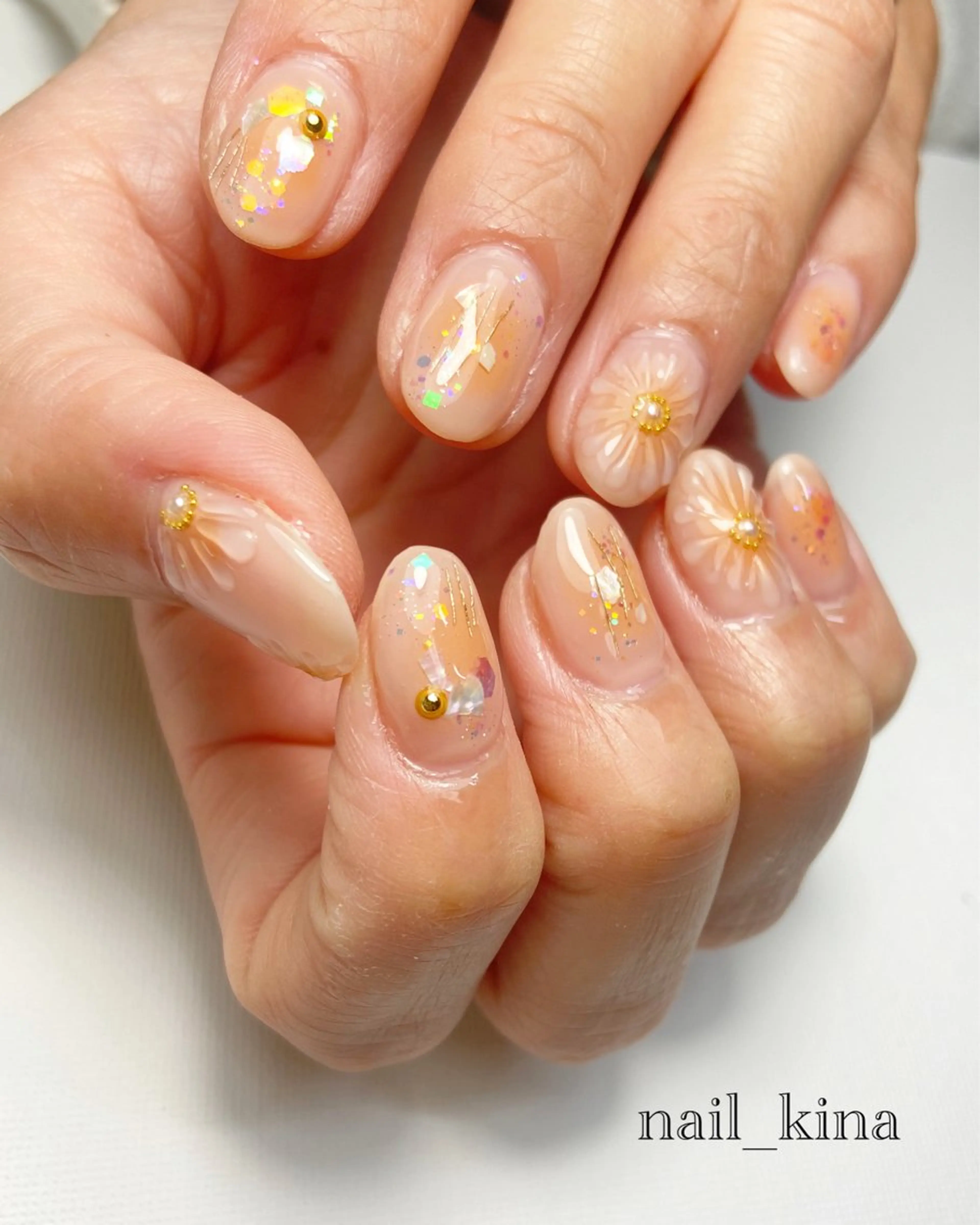 ネイル チークネイル フラワーネイル オフィスネイル オレンジ ハンドネイル nail_ kinaのネイルデザイン