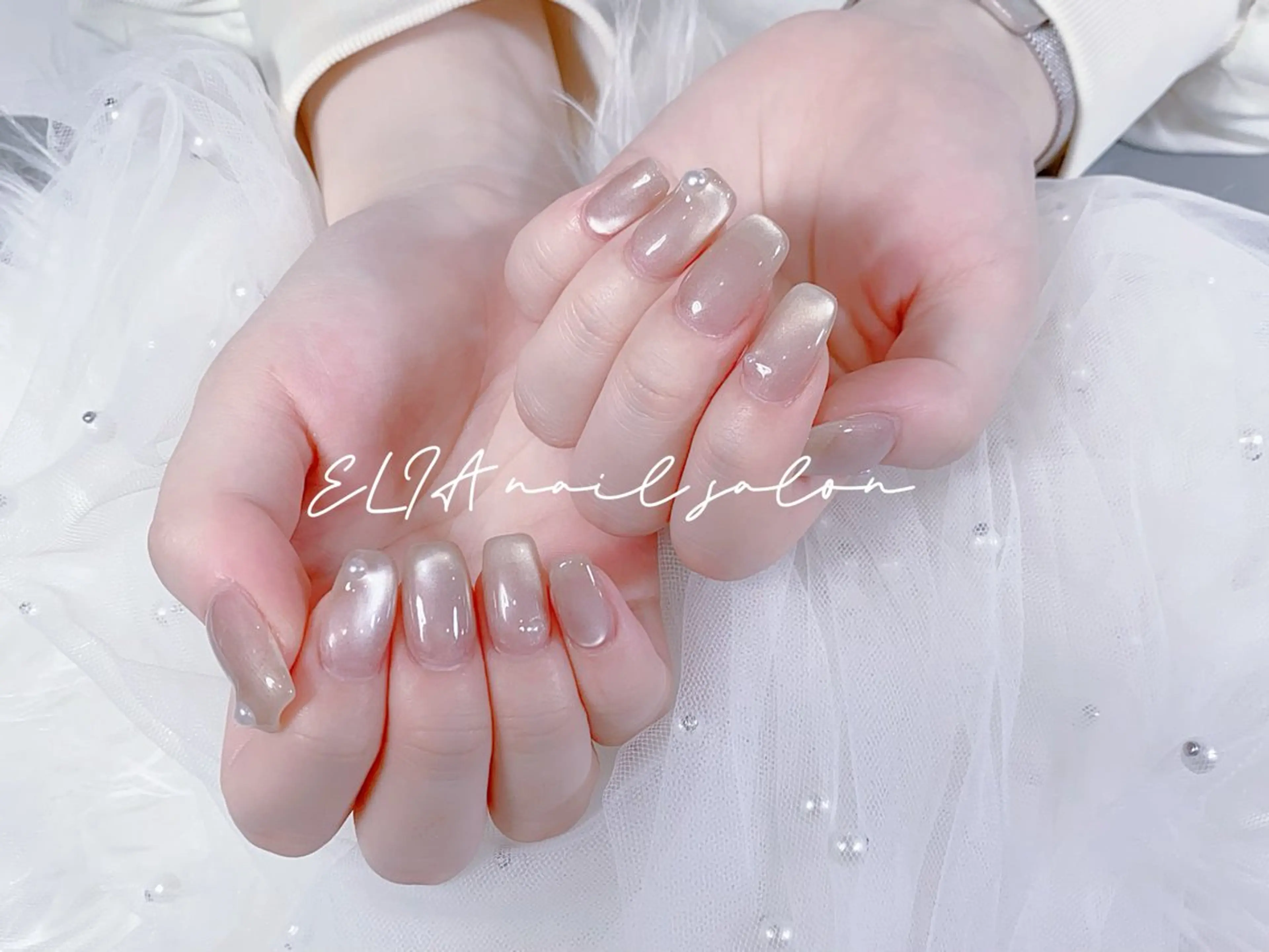 ネイル チークネイル 長さ出し グラデーション ラメ(グリッター) ラメグラデーション ハンドネイル ハンドケア ELIA【エリア】 nailsalonのネイルデザイン