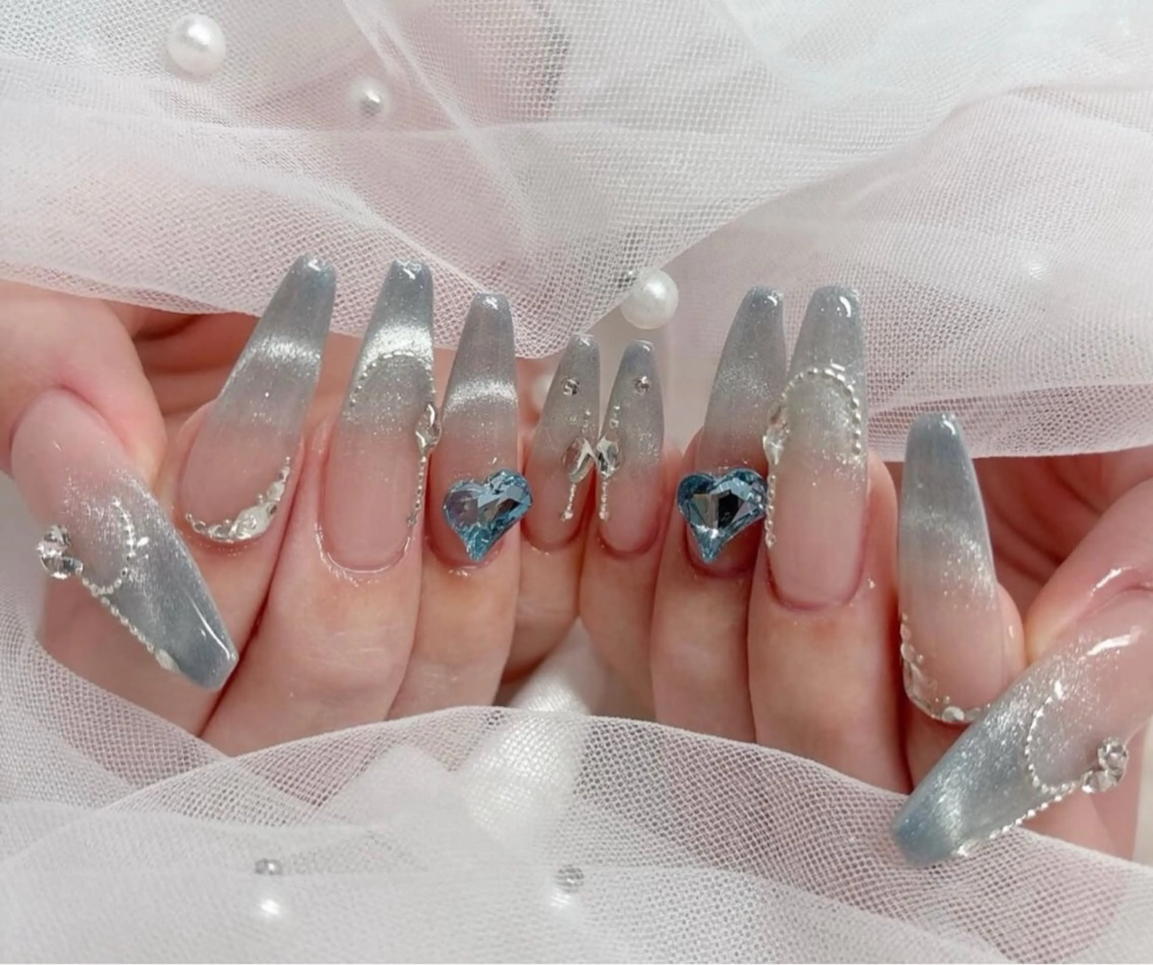 ネイル 成人式 ロングネイル マグネットネイル 大理石ネイル(マーブル) リボン ハンドネイル Amee Nailsalon所属・Amee Nailsalonのネイルデザイン