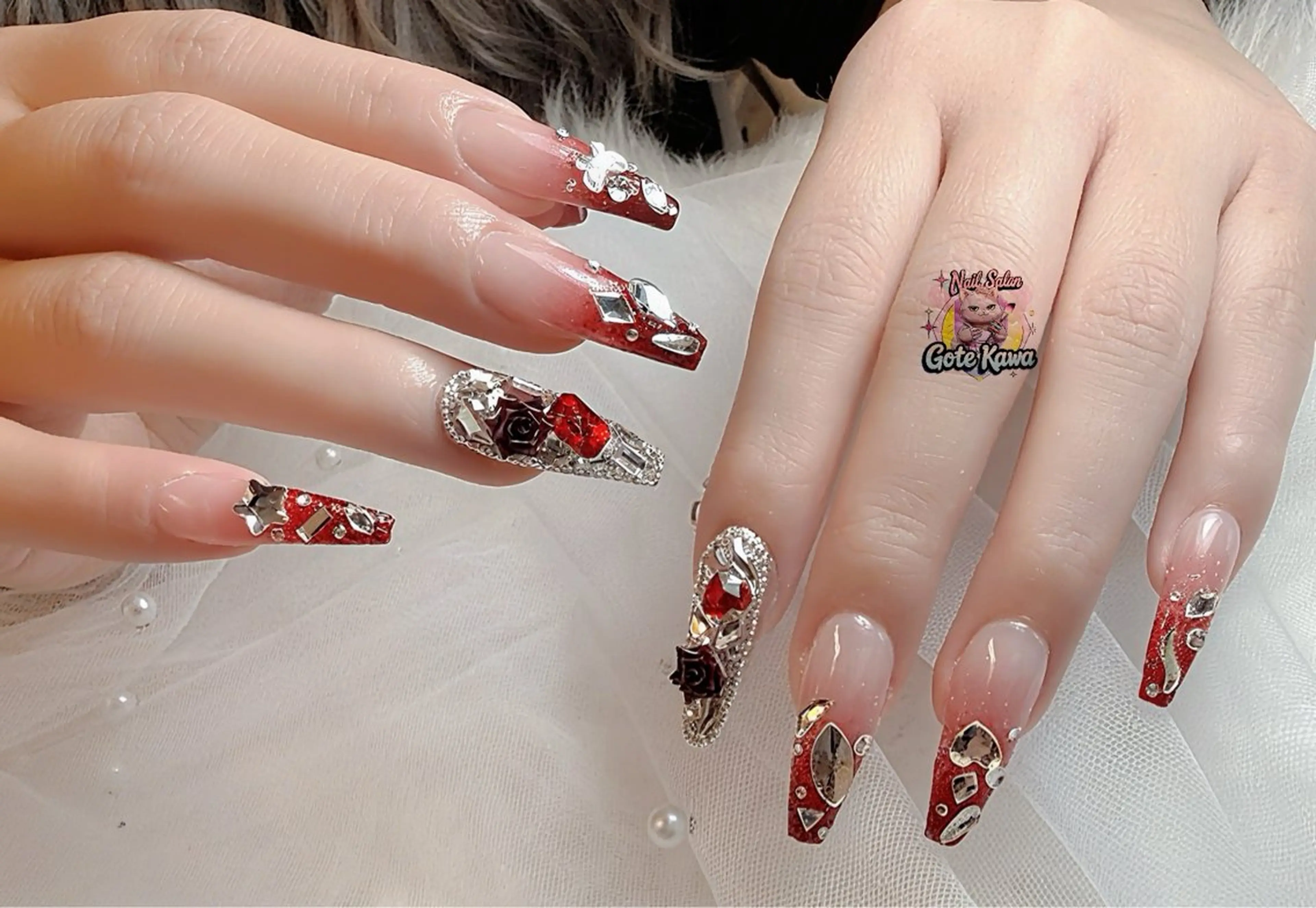 ネイル アートネイル 長さ出し キラキラネイル ピンク リボン ハンドネイル ハンドケア GOTE KAWA Nail Salon(ゴテかわ)所属・Gote Kawa nail salonのネイルデザイン