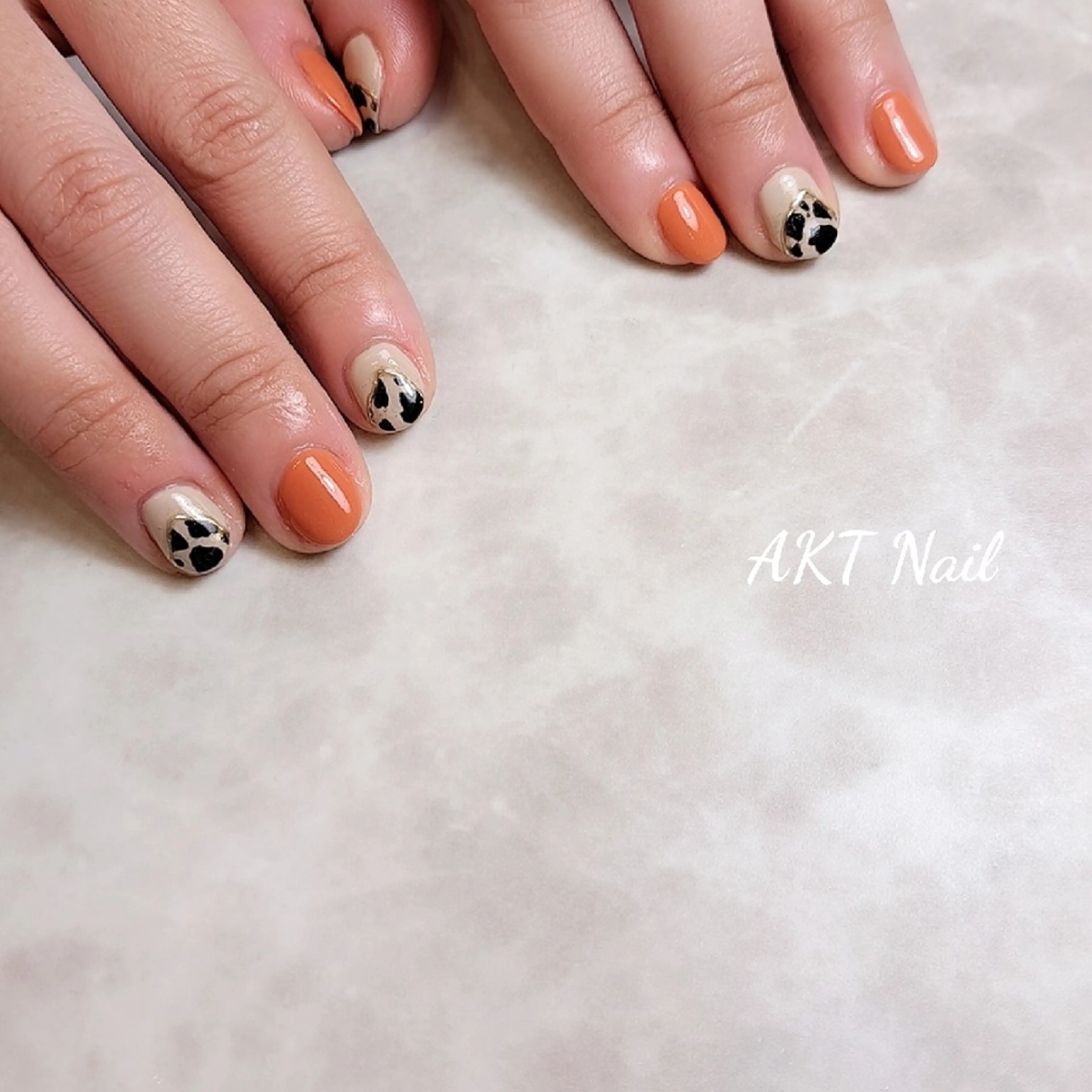 ネイル オレンジ AKT NAIL所属・AKT Beauty ドライヘッドスパのネイルデザイン