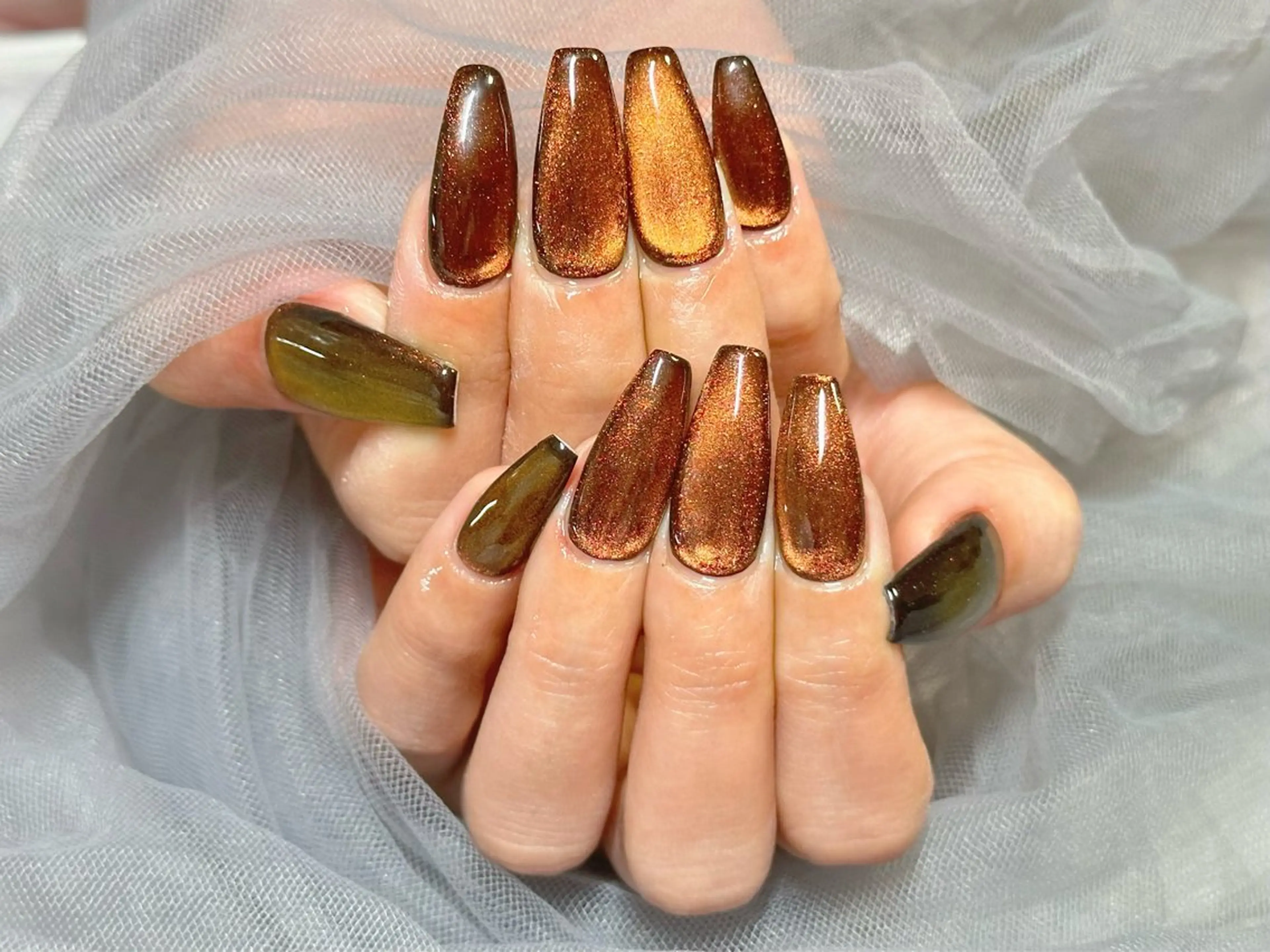 ネイル マグネットネイル オレンジ ハンドネイル KURELLY所属・Nail Salon KURELLYのネイルデザイン