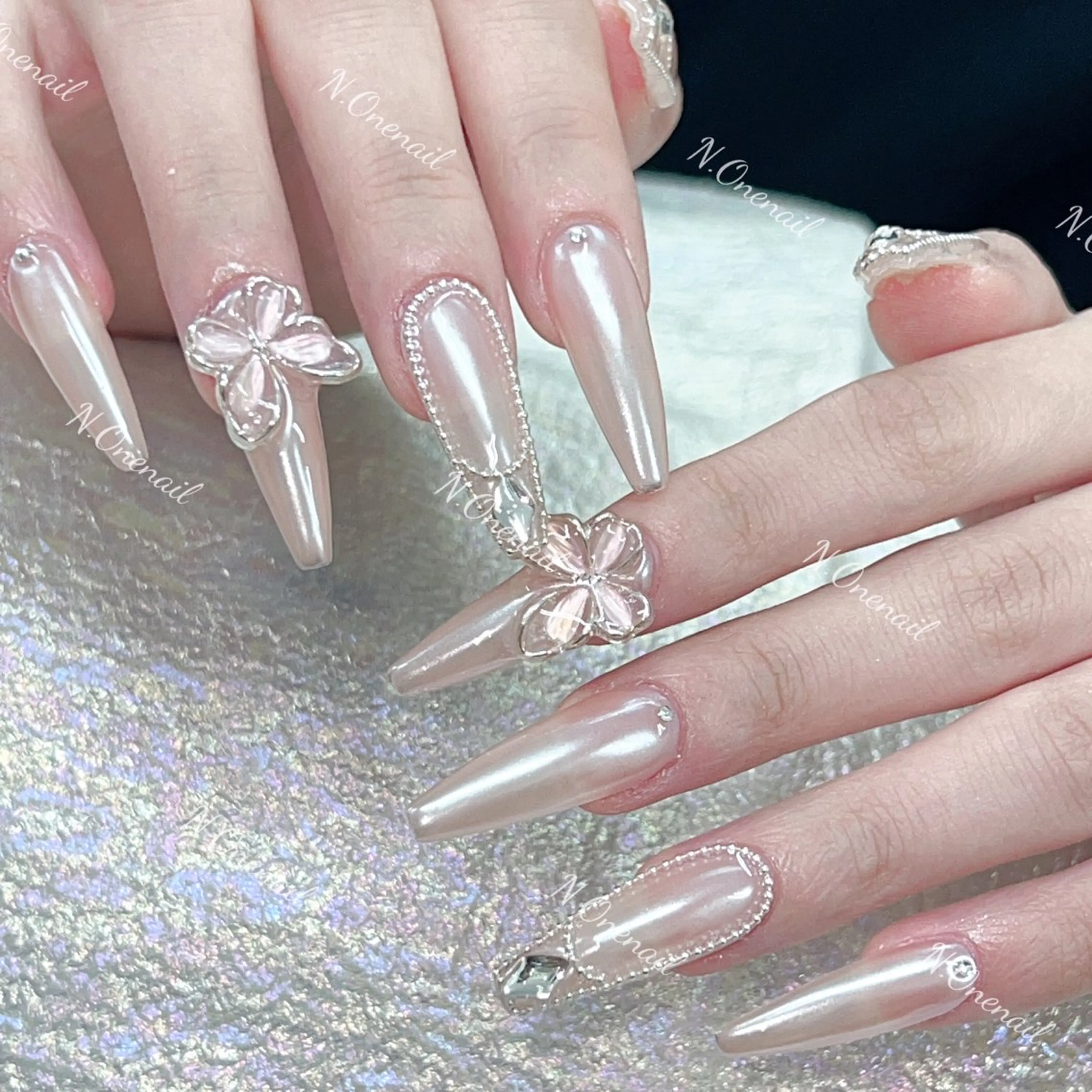 ネイル キラキラネイル 持ち込み ピンク リボン シンプルネイル 長いだし/スカルプ/ パラシェルN.oneのネイルデザイン