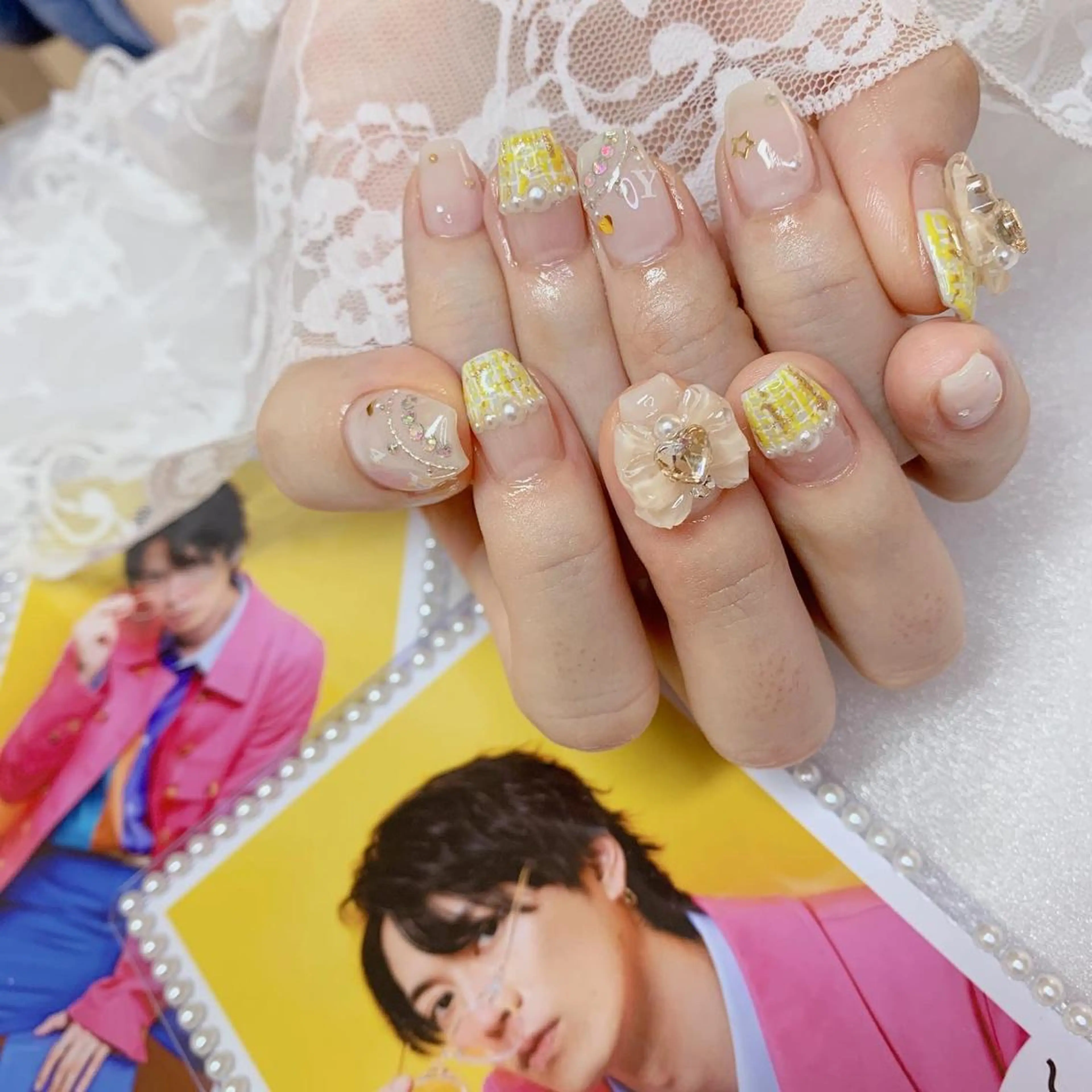 ネイル リボン 黄色 ハンドネイル La neige* yuki 🥯🍑のネイルデザイン