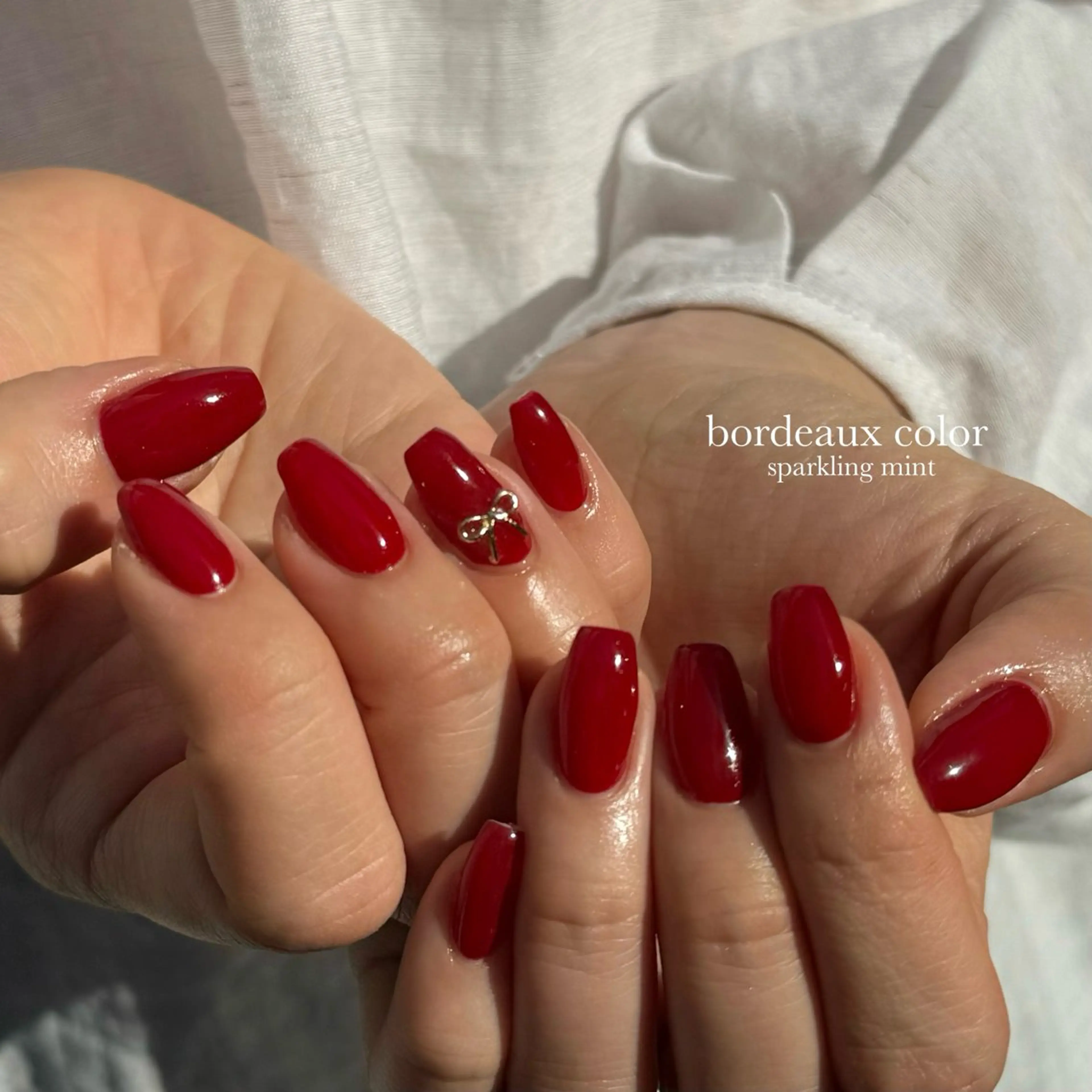 ネイル ボルドー ゴールド リボン sparkling mint【スパークリングミント】所属・natsuki 🎀💎モデル様募集のネイルデザイン