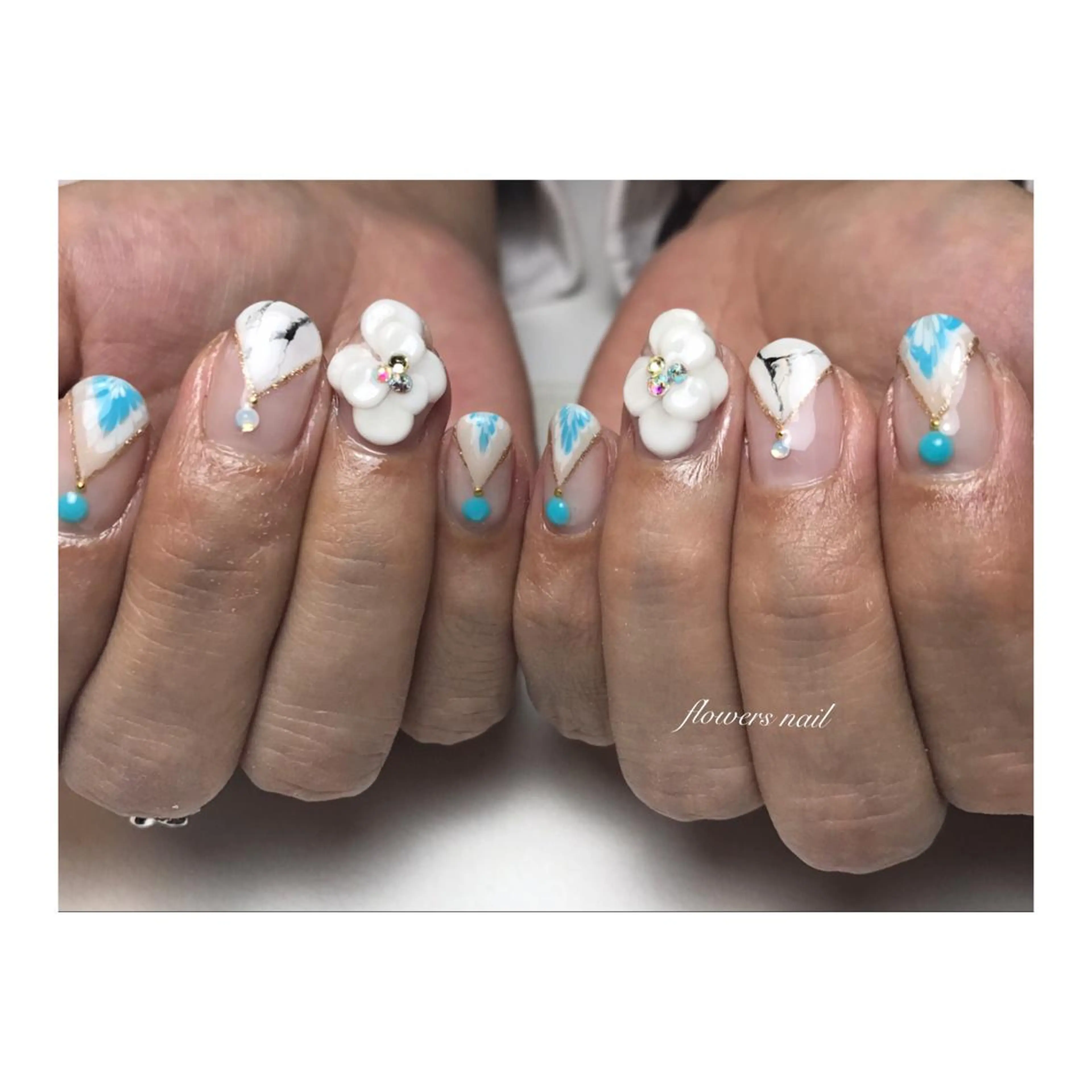 ネイル ピーコックネイル flowers nailのネイルデザイン