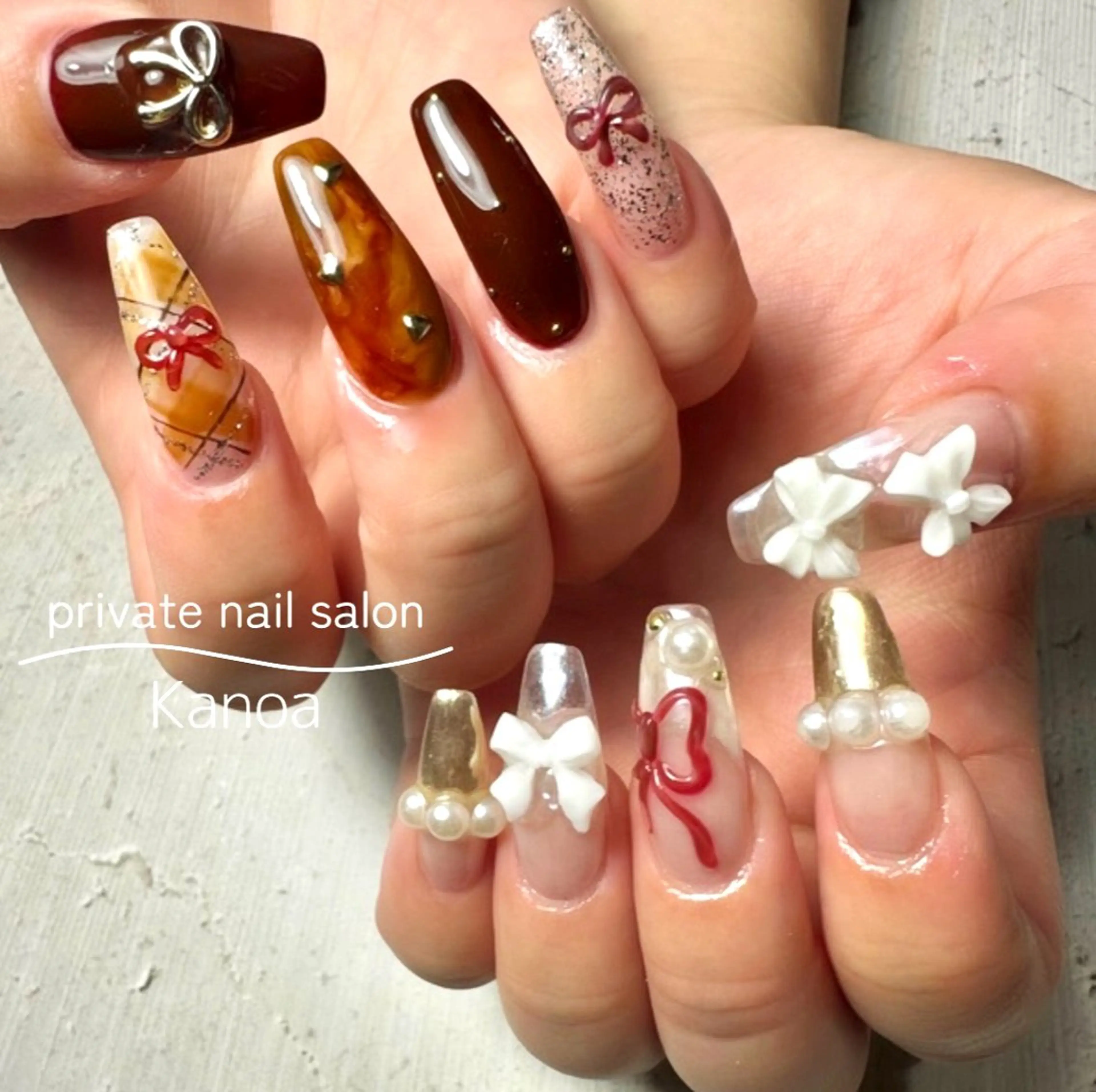 ネイル リボン ハンドネイル megu_ kanoanailのネイルデザイン
