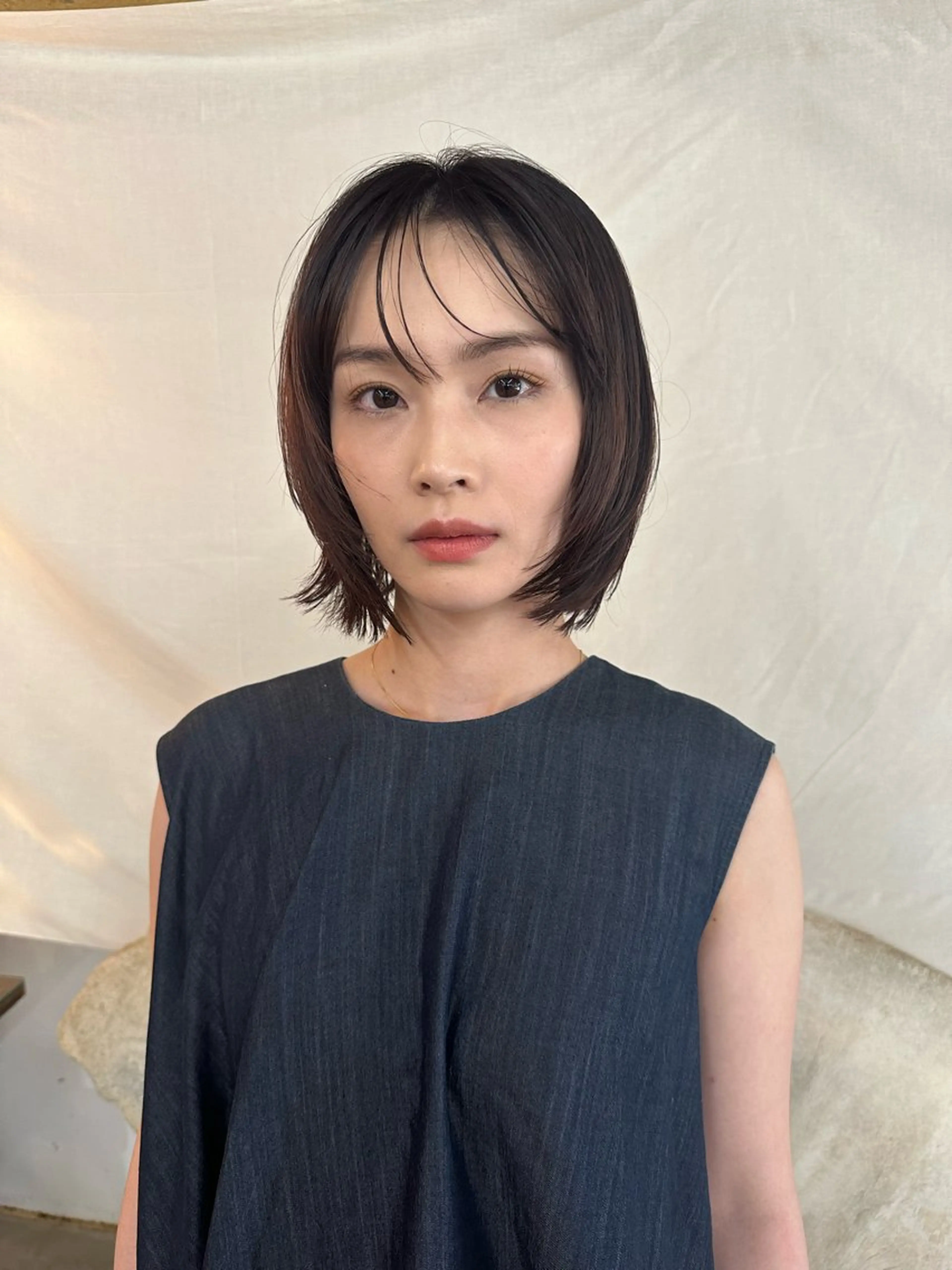 ツヤっぽいカラーと丁寧なカットの写真