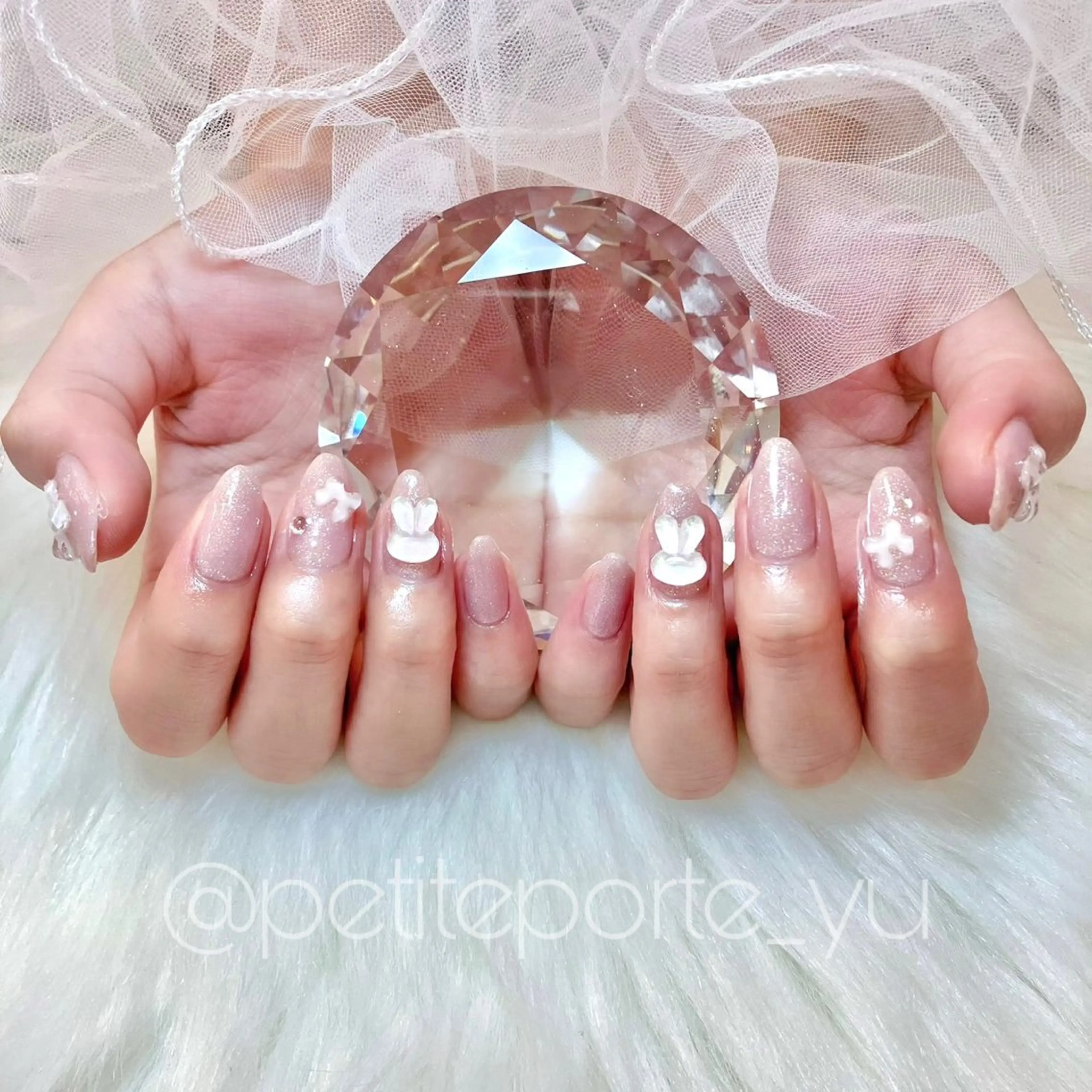 ネイル 長さ出し ラメ(グリッター) ワンカラーネイル ピンク リボン ハンドネイル nailsalon petite porte所属・petite porteのネイルデザイン