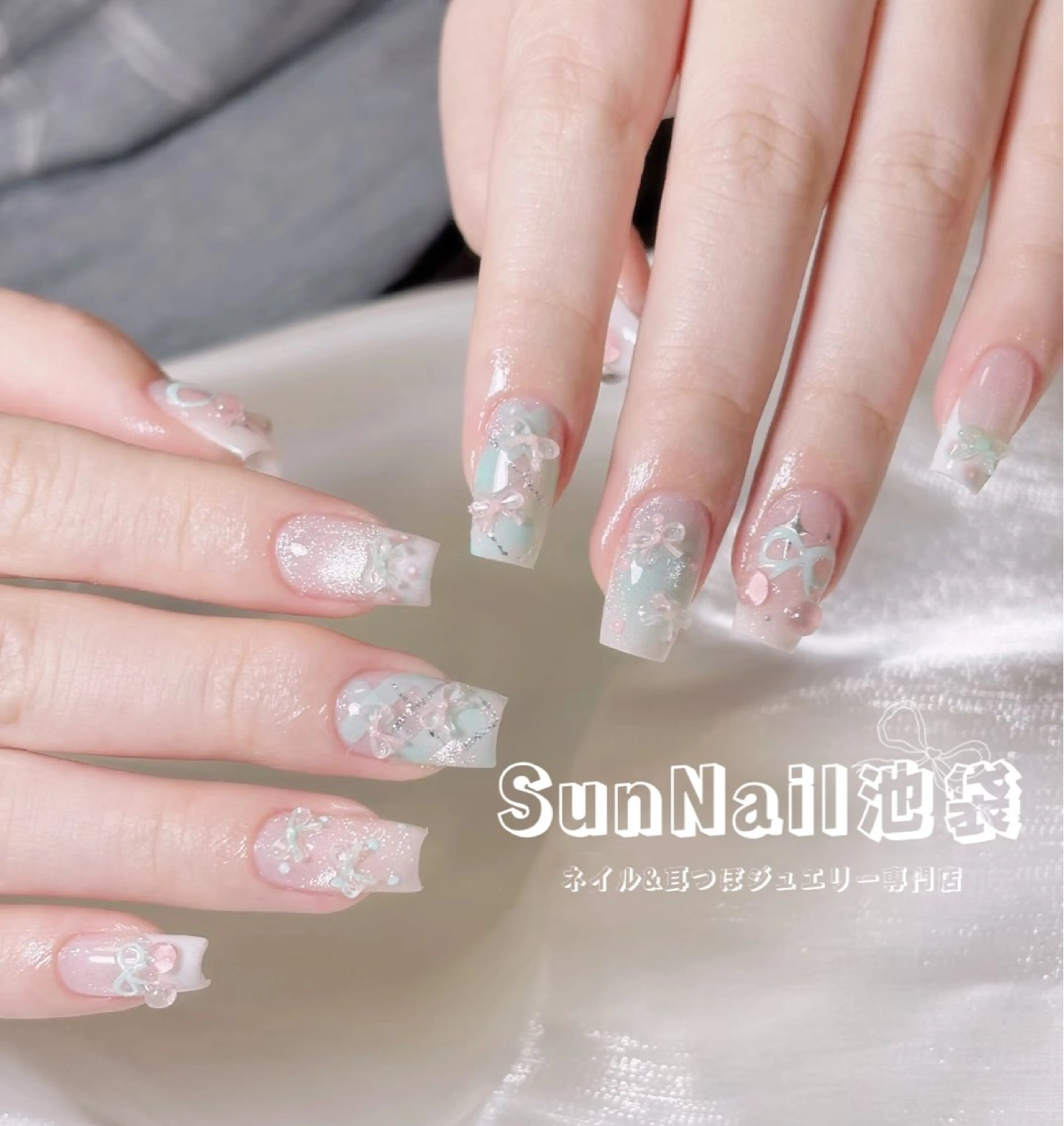 ネイル チークネイル 長さ出し フラワーネイル フレンチネイル ガーリー ハンドネイル ハンドケア Sun Nail 池袋のエステ・リラクイメージ