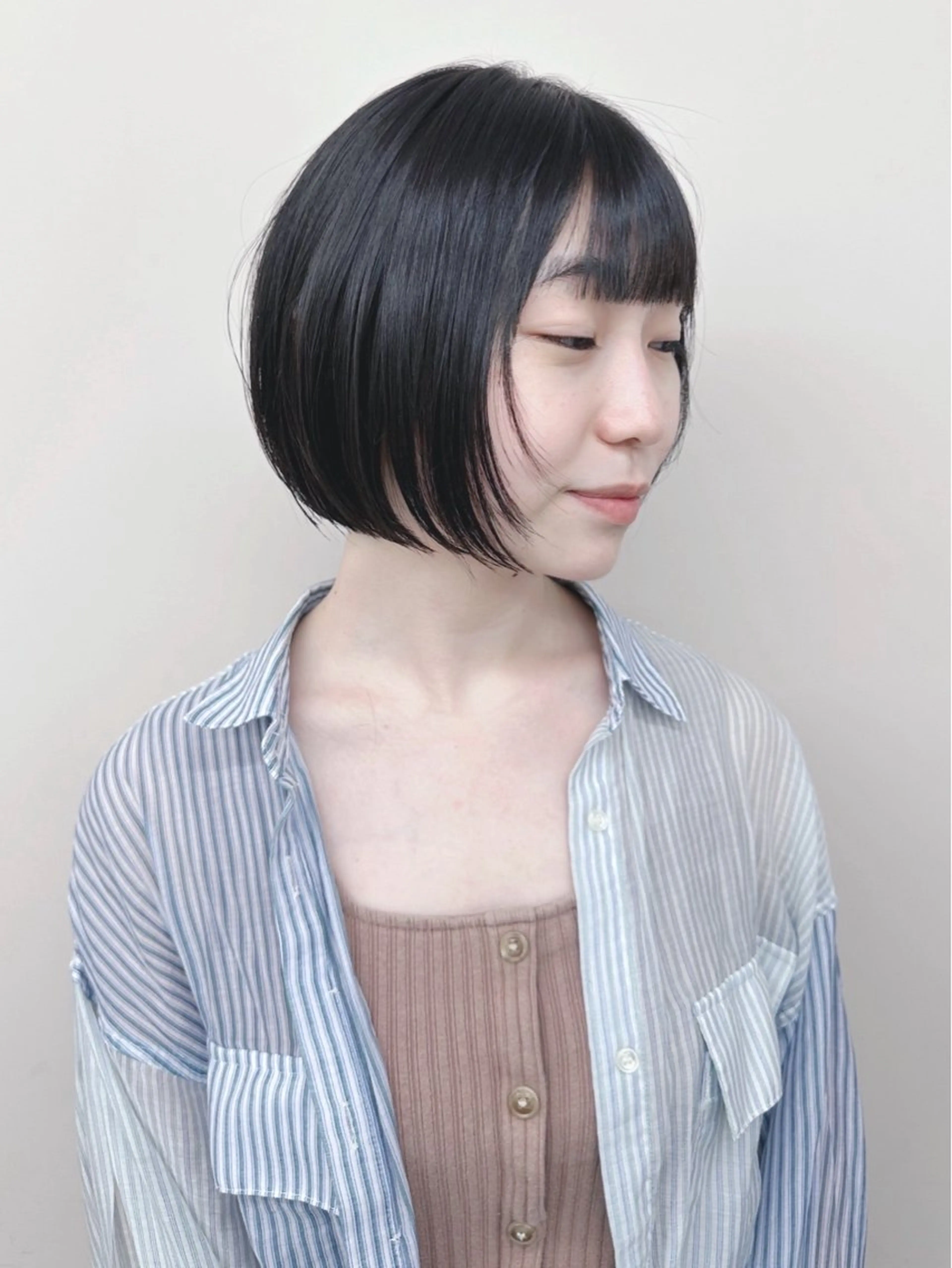 ショート とうい/パーマボブ/ くせ毛/丸みボブのヘアスタイル