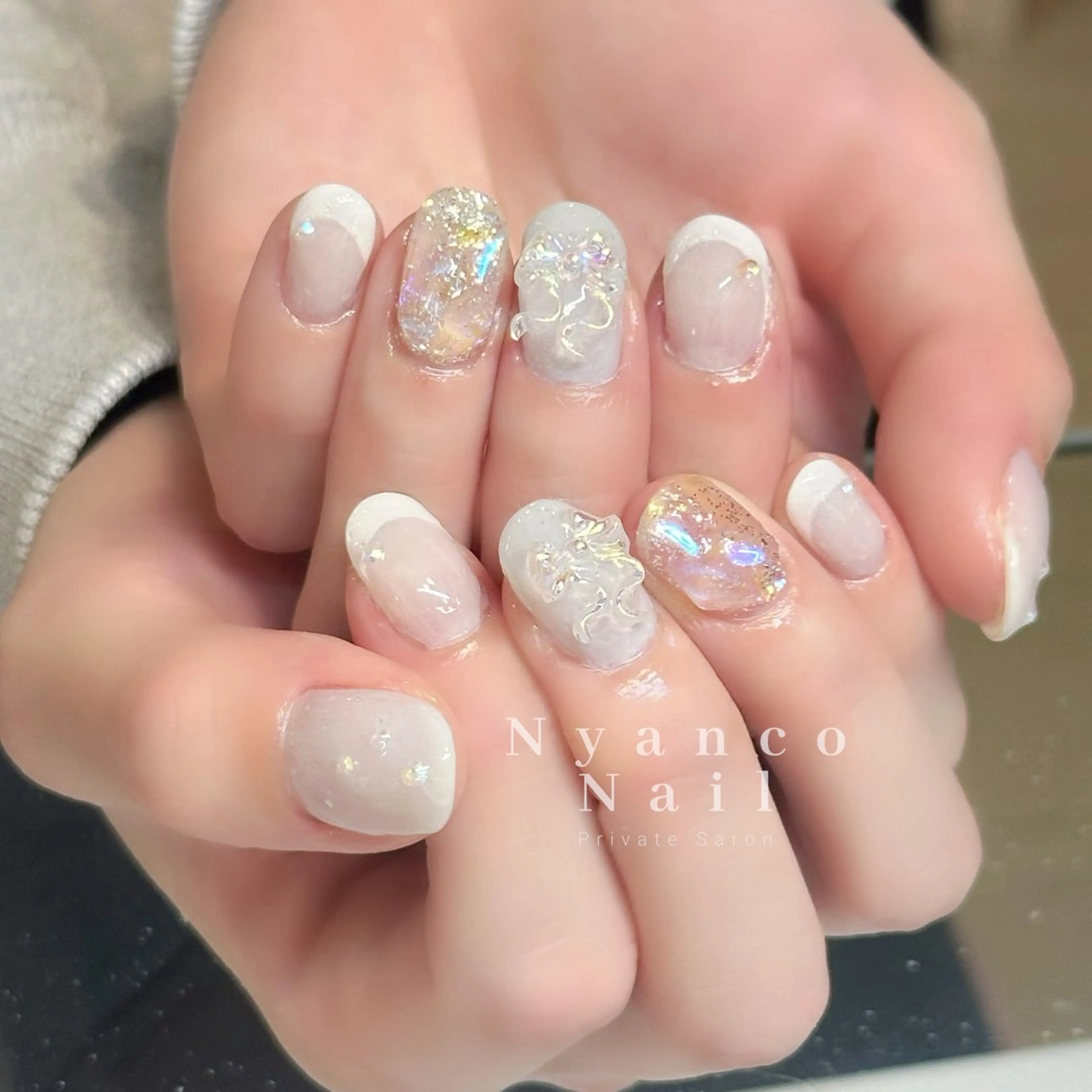 ネイル オーロラネイル フレンチネイル ジェルネイル 水色 春ネイル Nyanco Nailのネイルデザイン